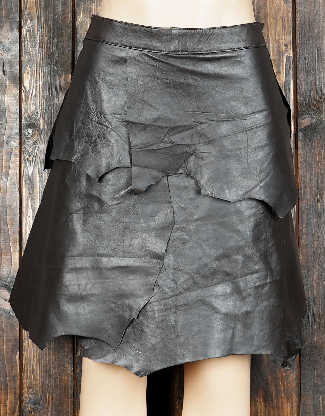 Artisan-made skirt highlighting natural leather textures and rustic charm