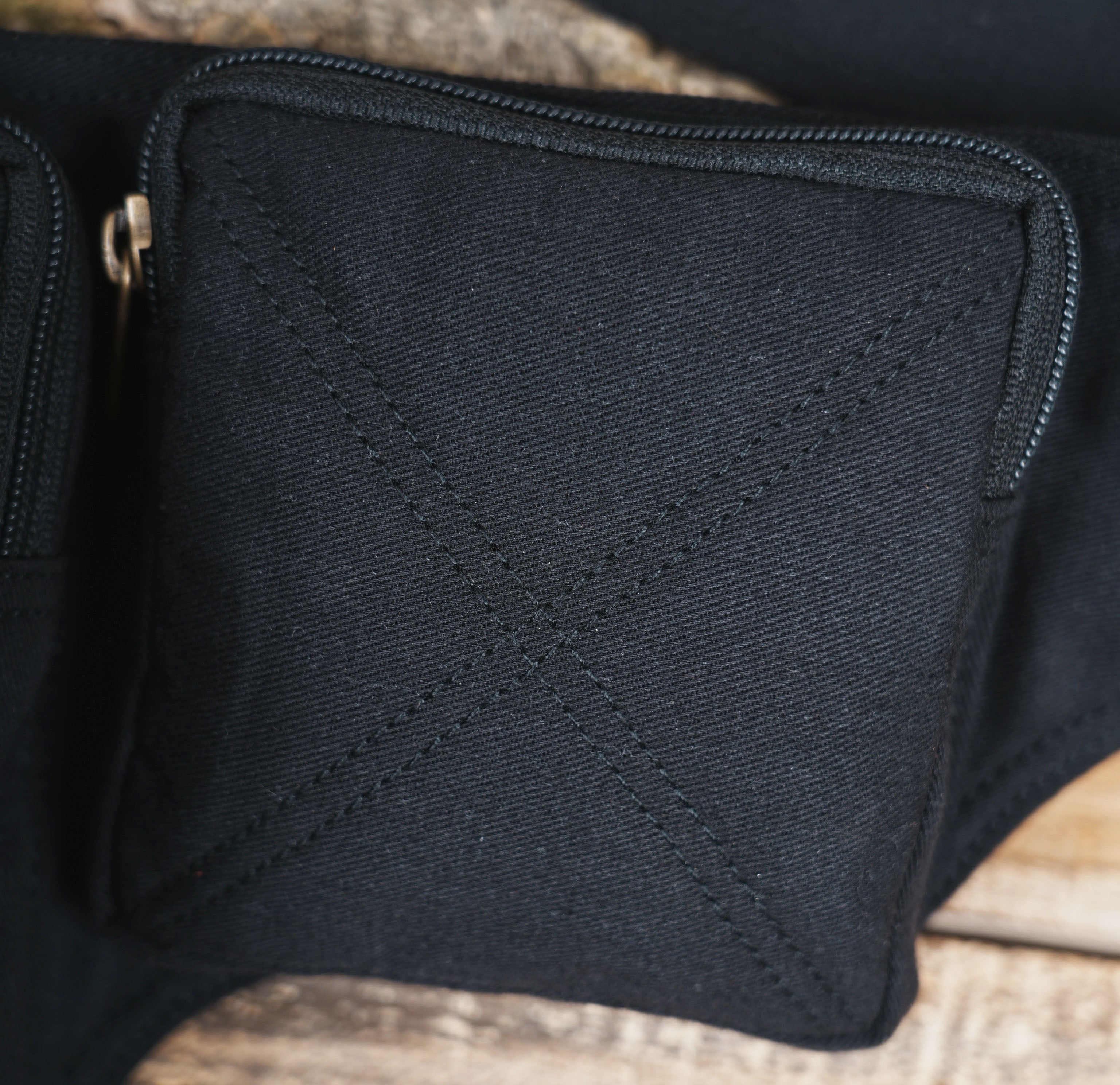 Multi pocket waist bag with snap closures and zip compartments