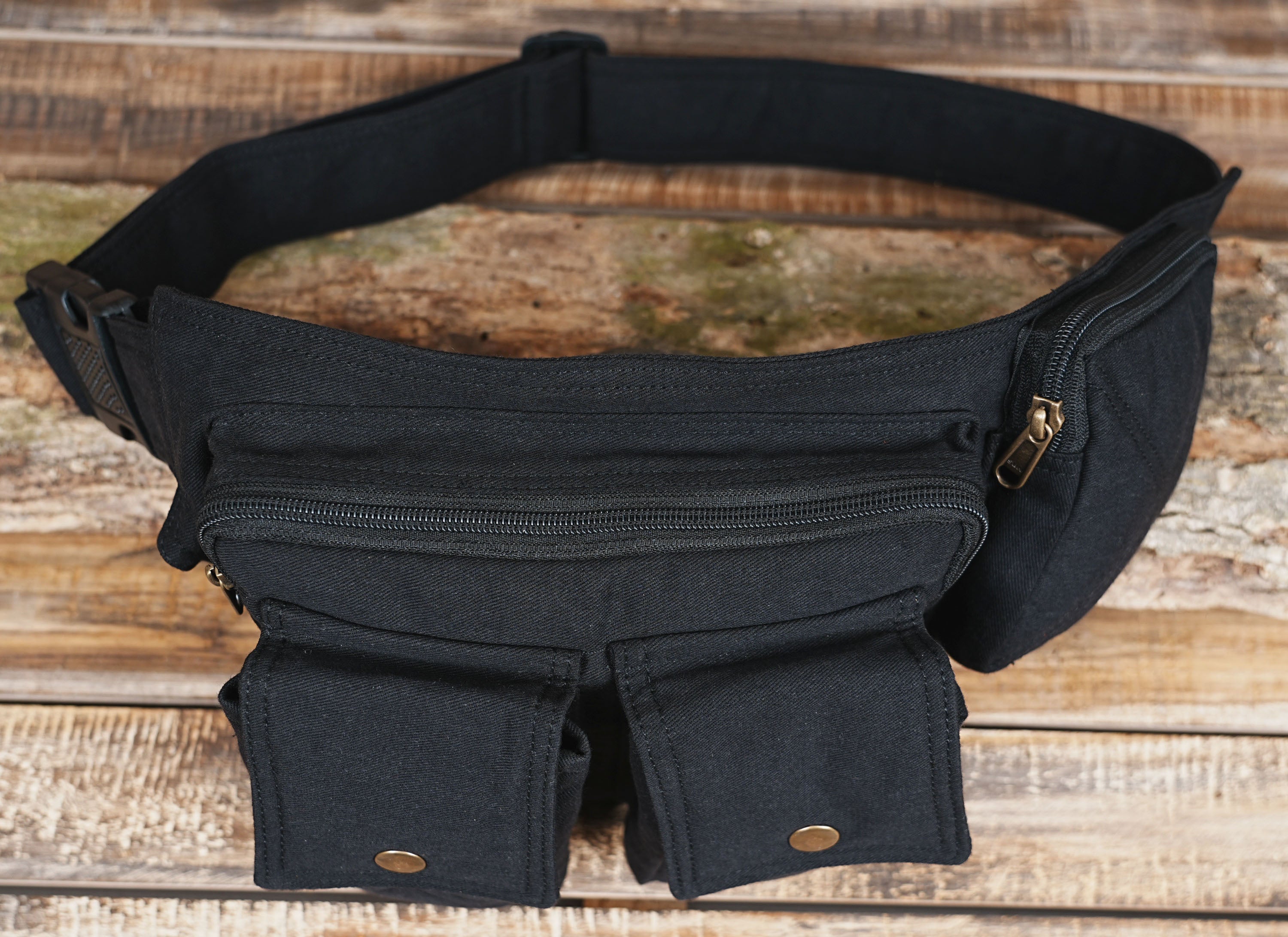 Canvas hip bag with plastic clip buckle, worn around the waist