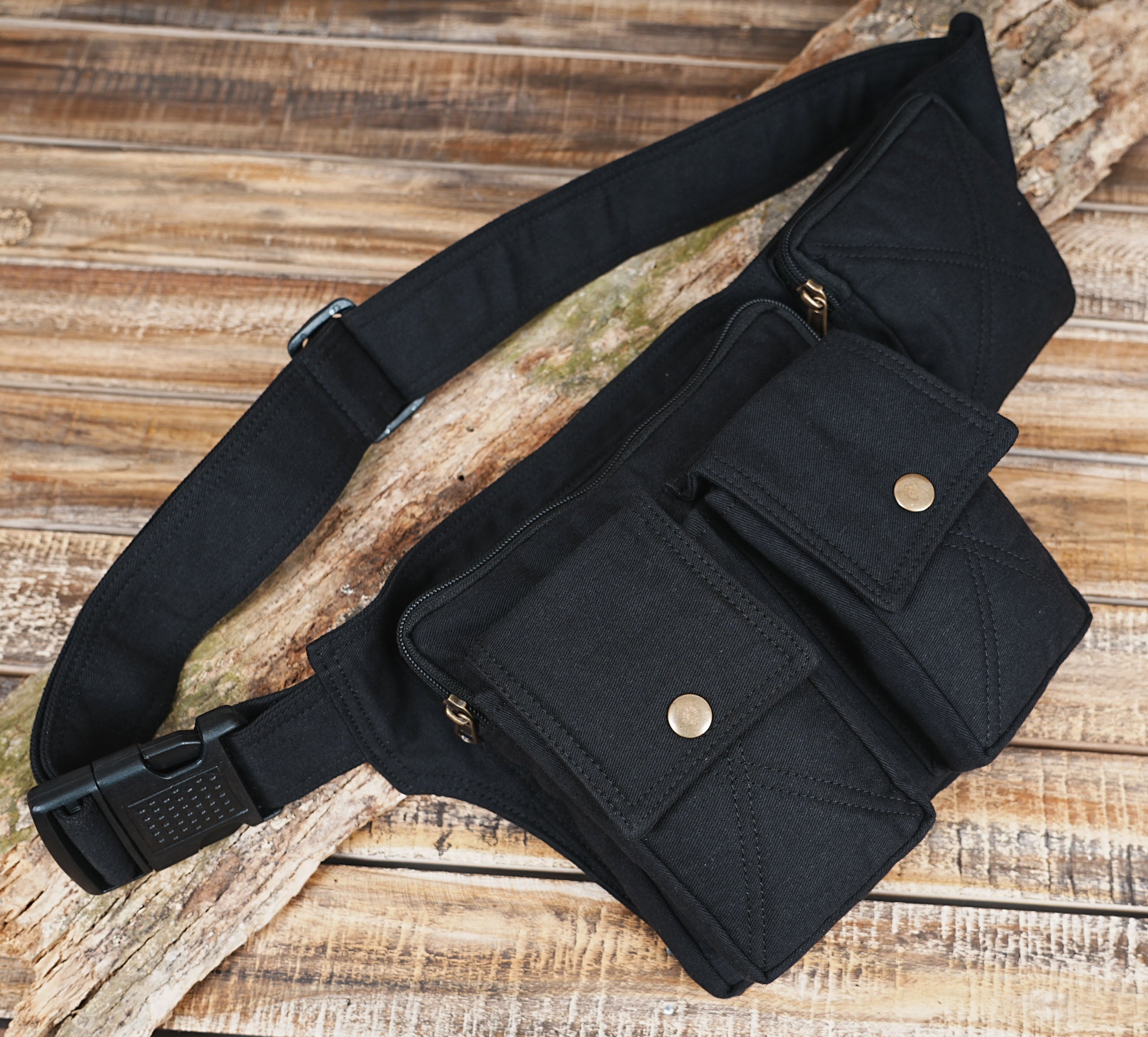 Tactical style waist bag with three separate pocket compartments