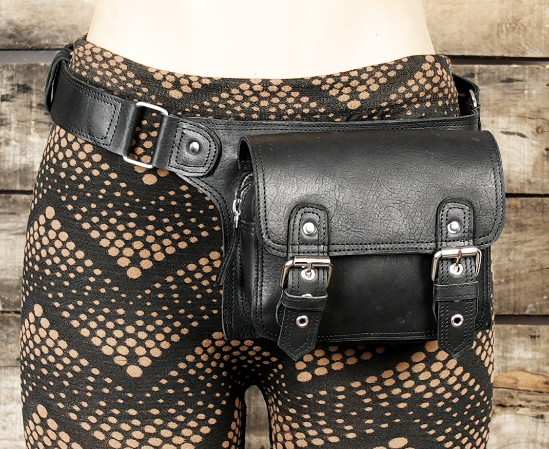 Leather waist belt with durable stitching and metal buckles