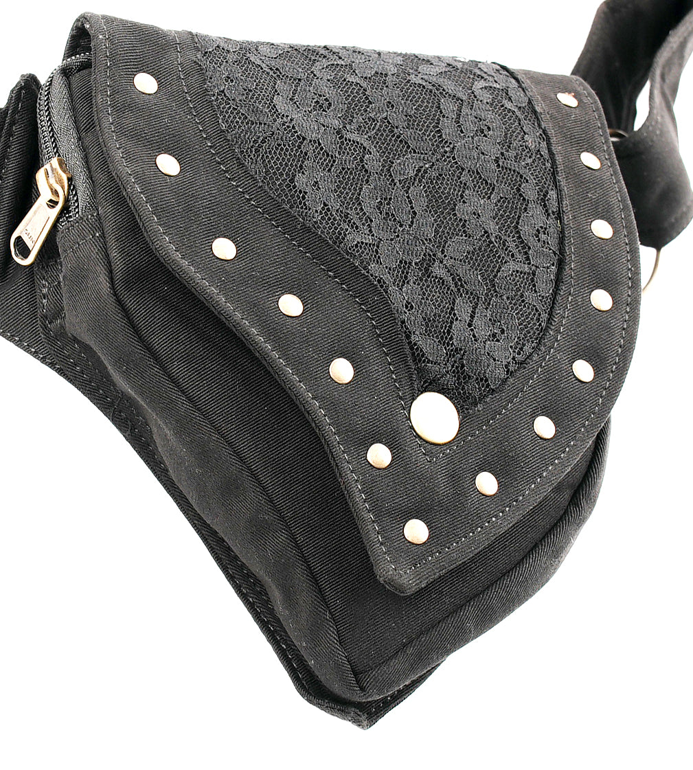 Alternative-style hip bag made from black cotton canvas with distinctive gold buckle and studs.