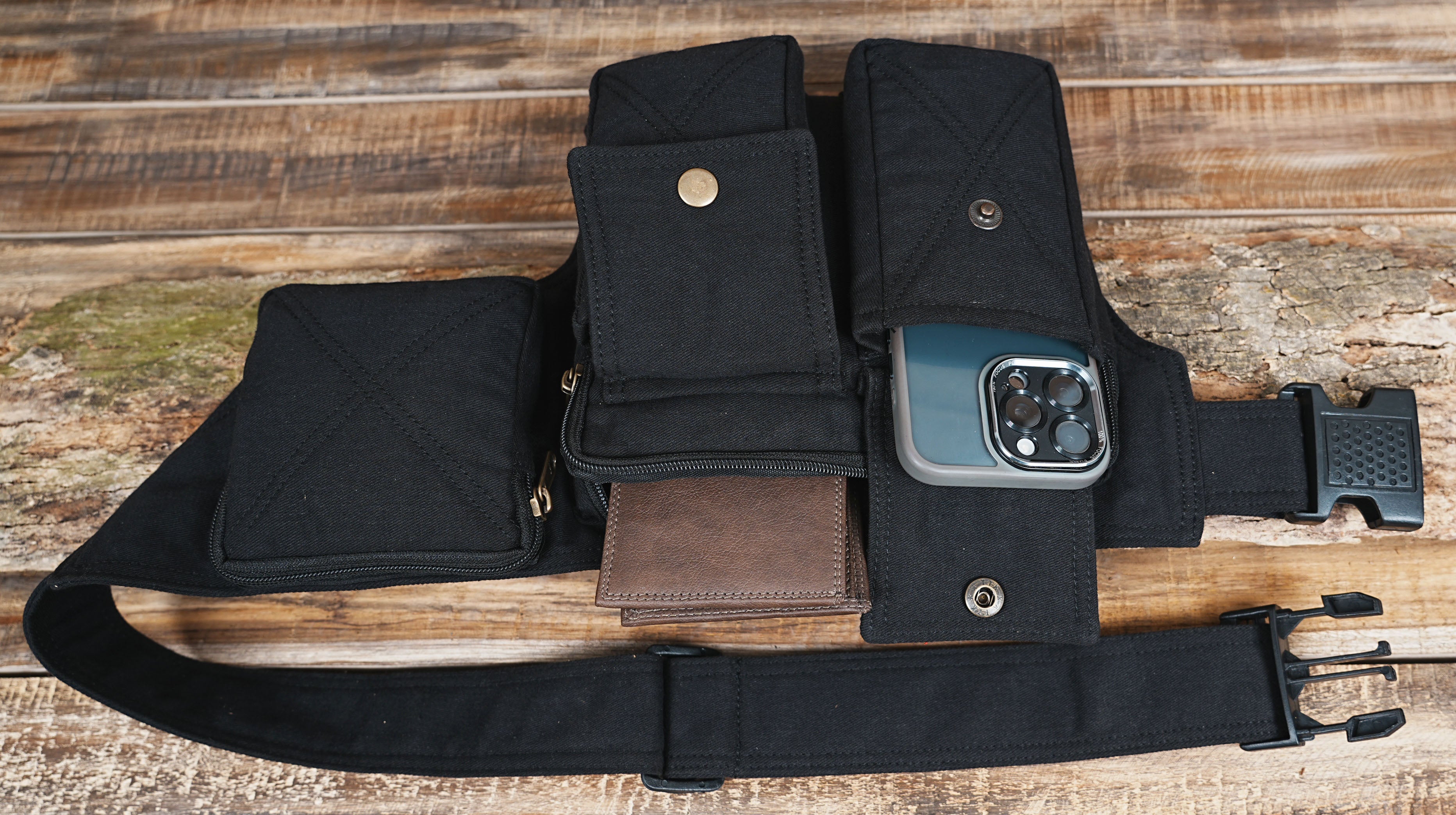 Black canvas waist pouch with multiple zip and snap pockets