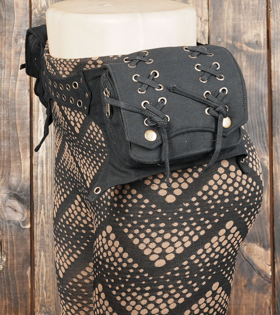 Gothic-inspired black canvas hip belt featuring lace-up pockets and antique brass hardware.