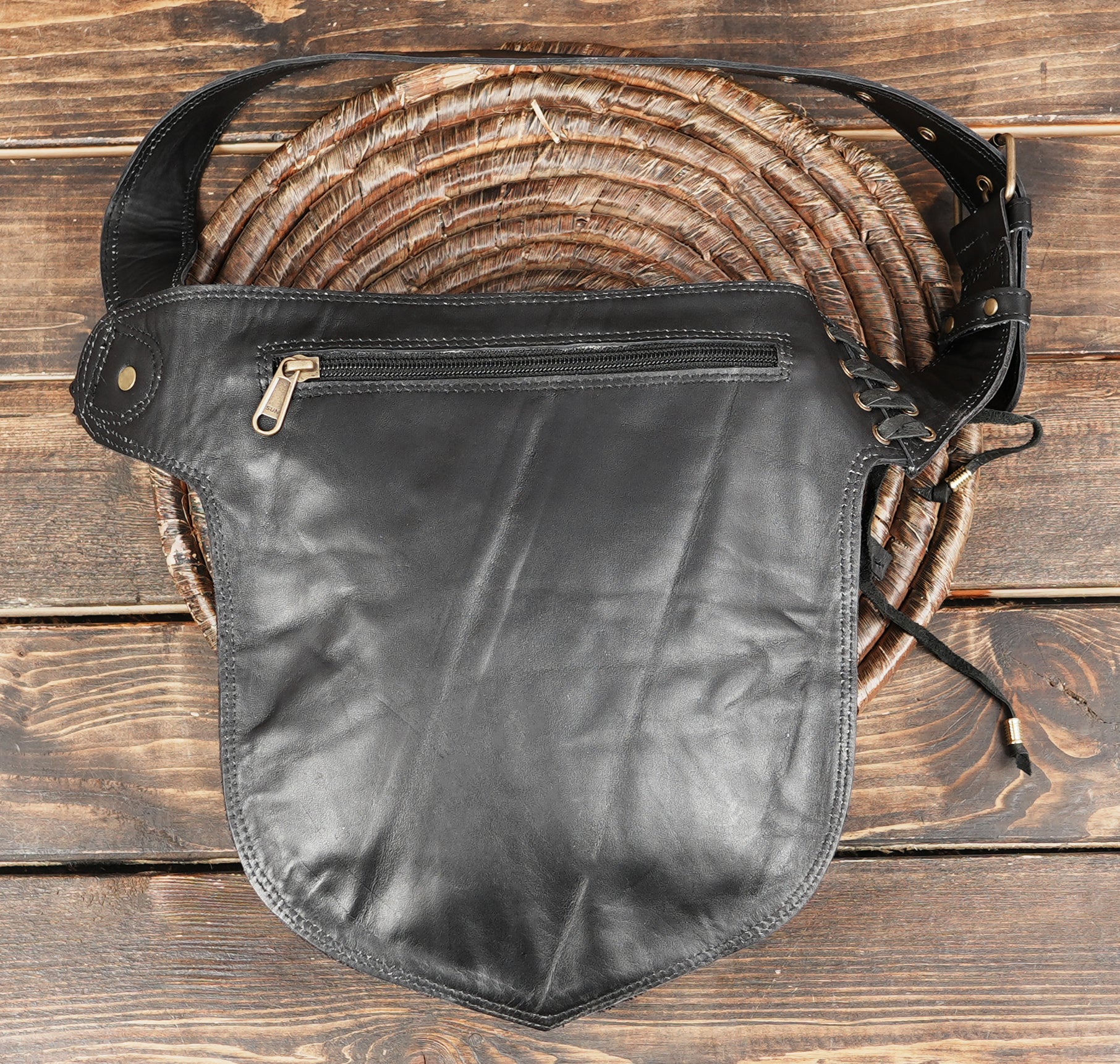 Adjustable leather belt pouch with gemstone centerpiece