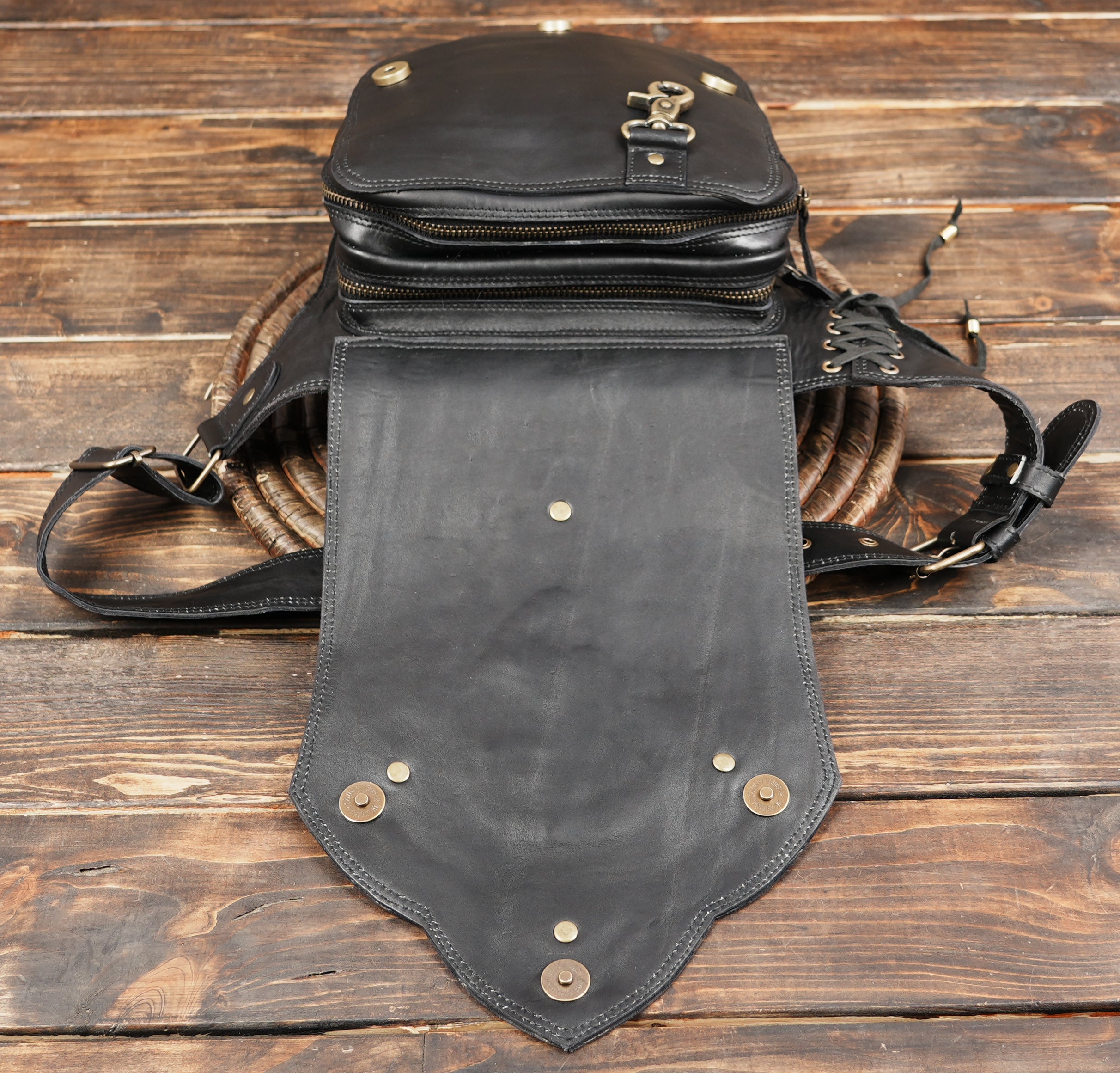Black leather utility belt with gemstone and stitched layers