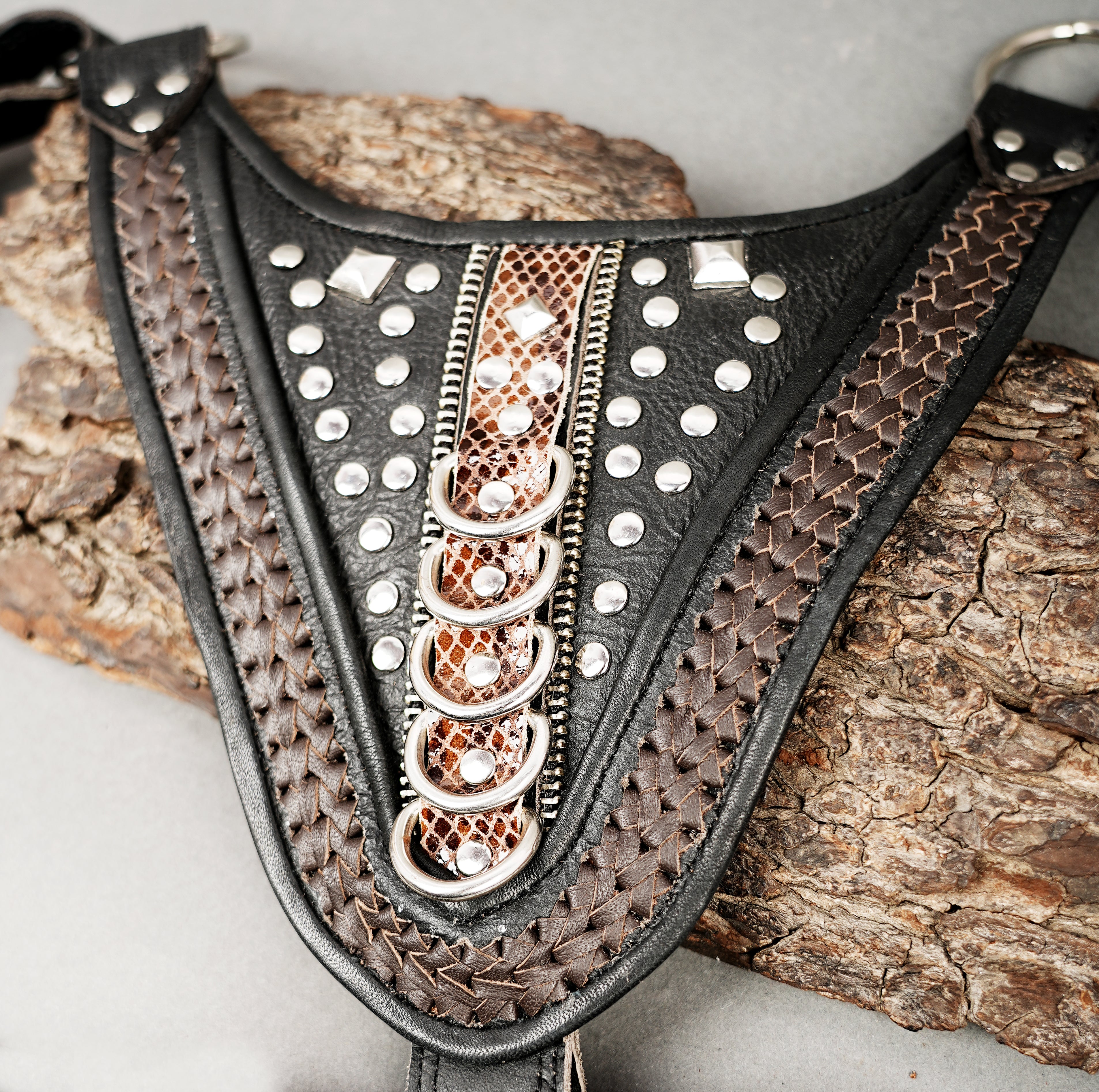 Festival-style leather shoulder holster with engraved panel work