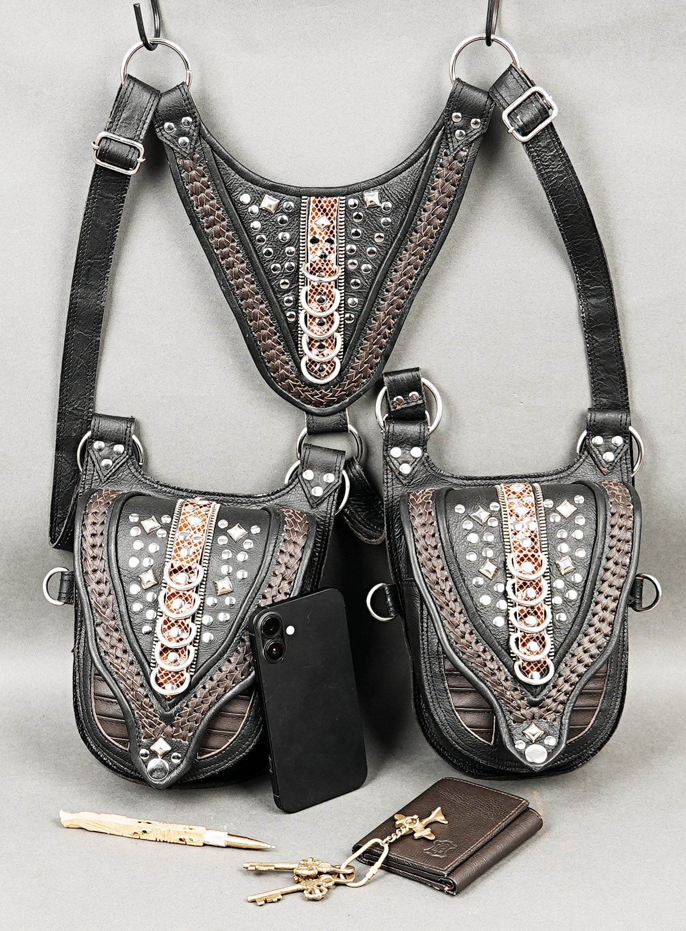 Unique artisan leather holster with detailed stud layout