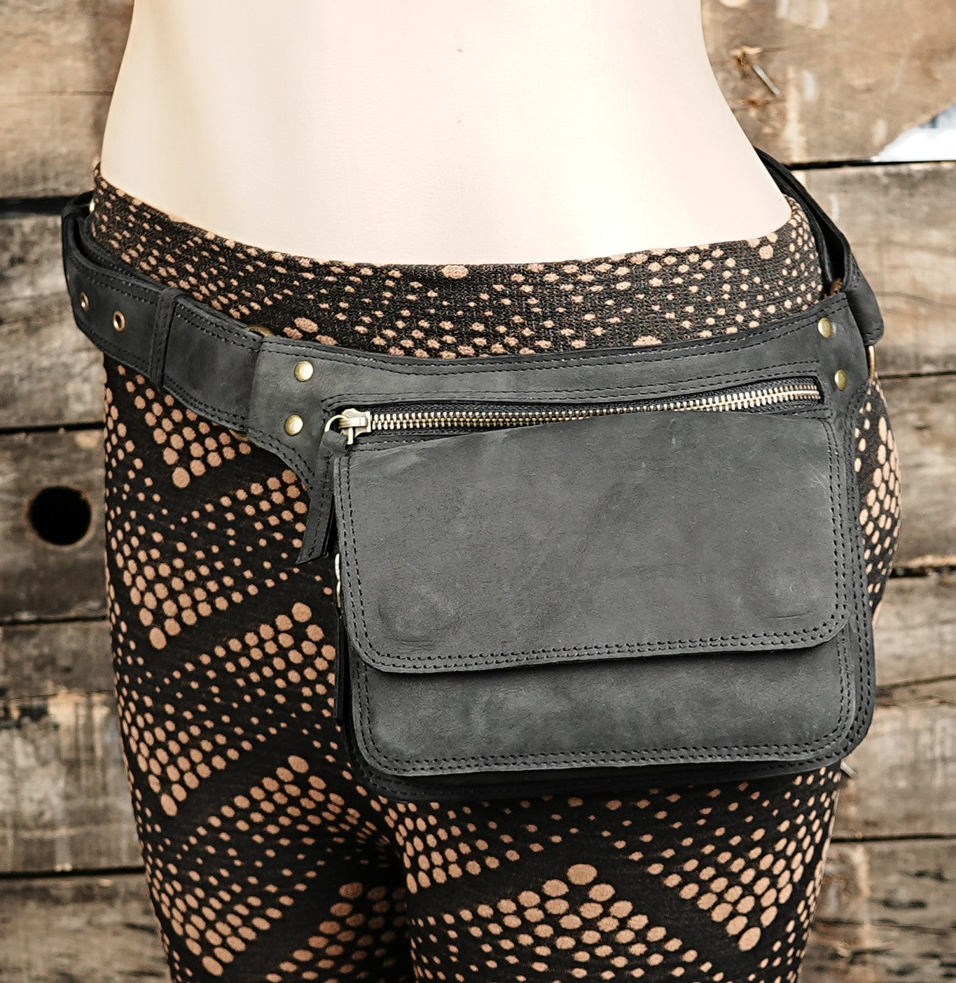 Steampunk style black leather waist bag with rivet strap