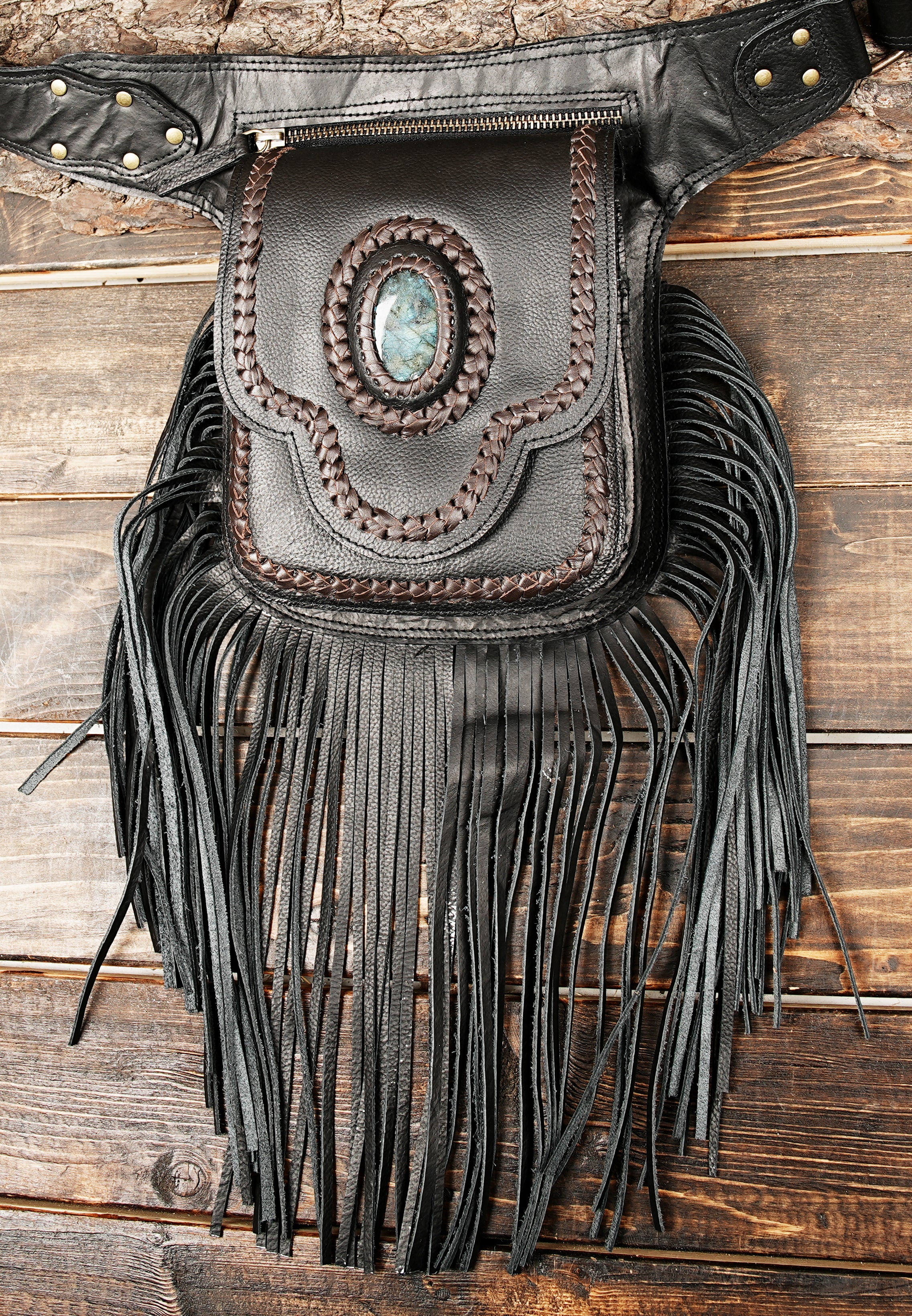 Artisan leather hip belt with gemstone detail and tassels