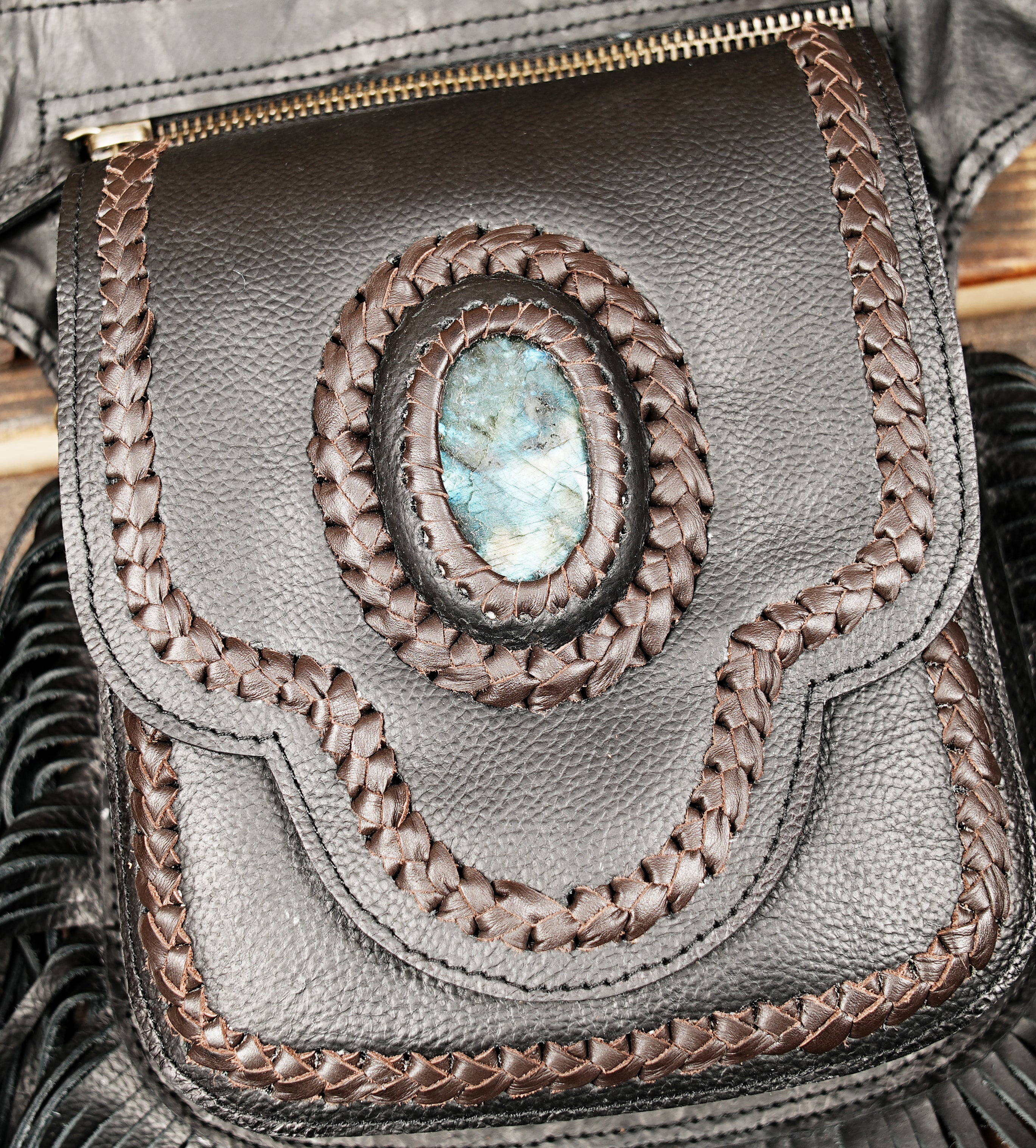 Black leather waist belt bag with gemstone accent