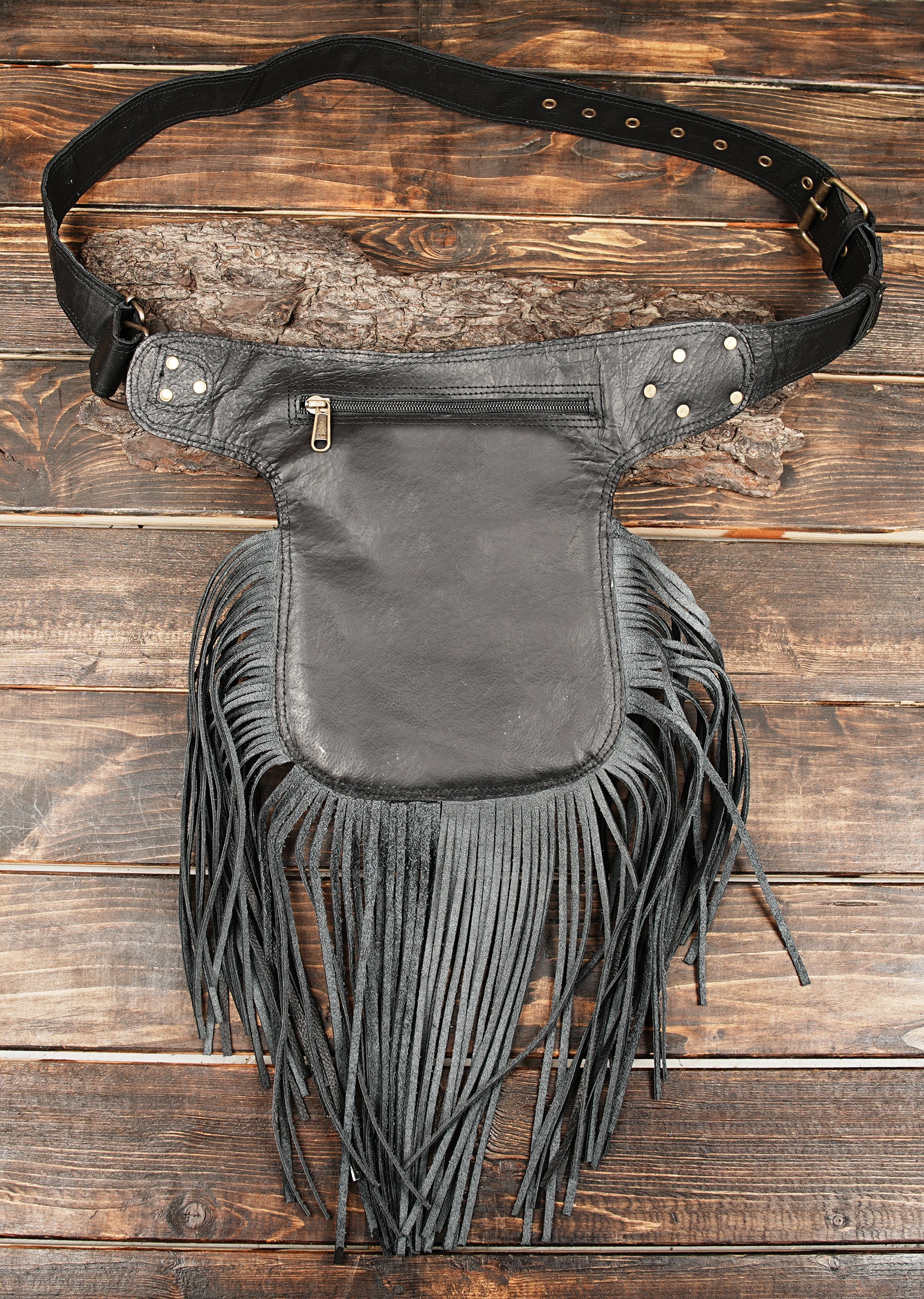Leather waist belt with gemstone centerpiece and fringe