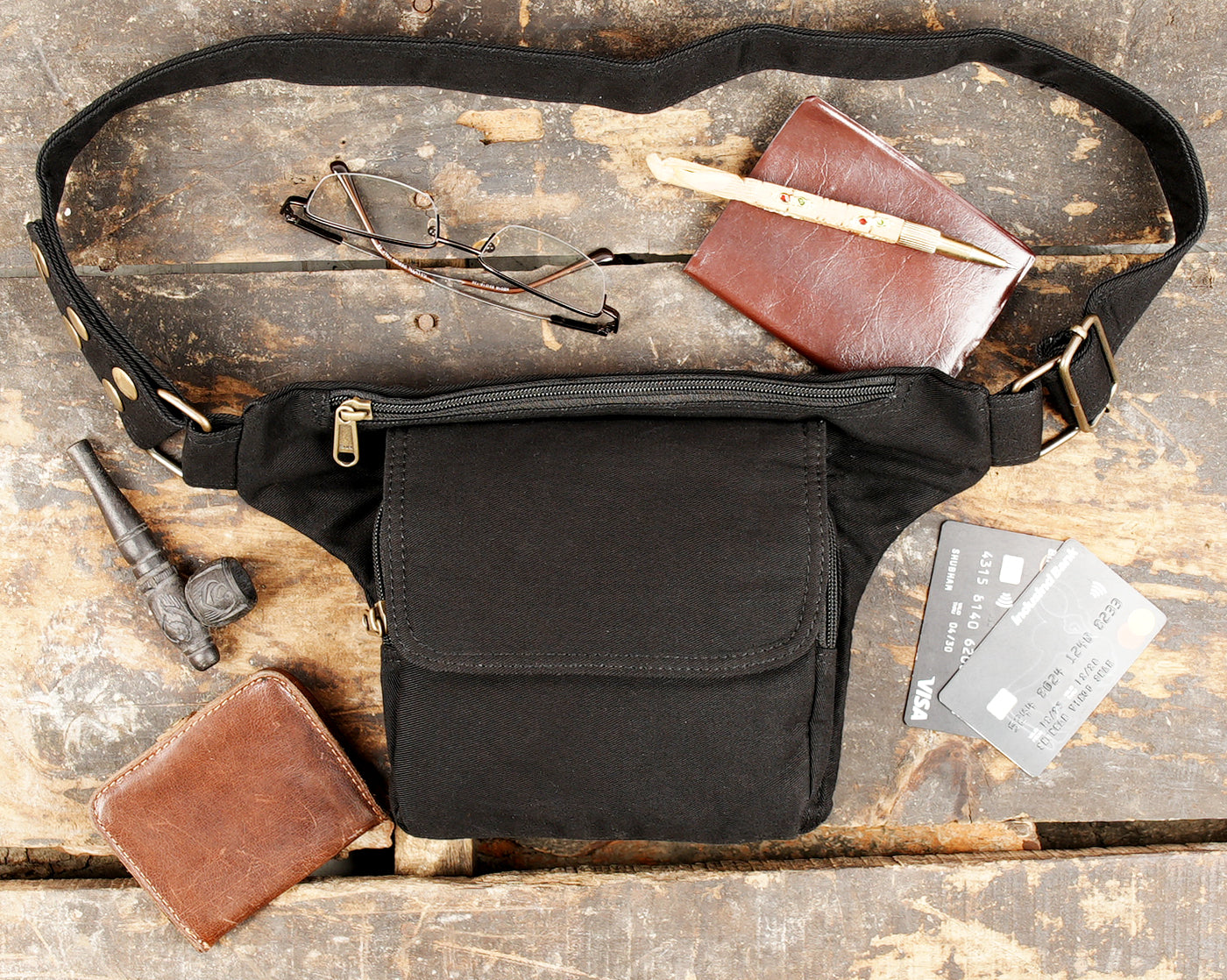Practical black canvas hip pouch with secure zip pocket