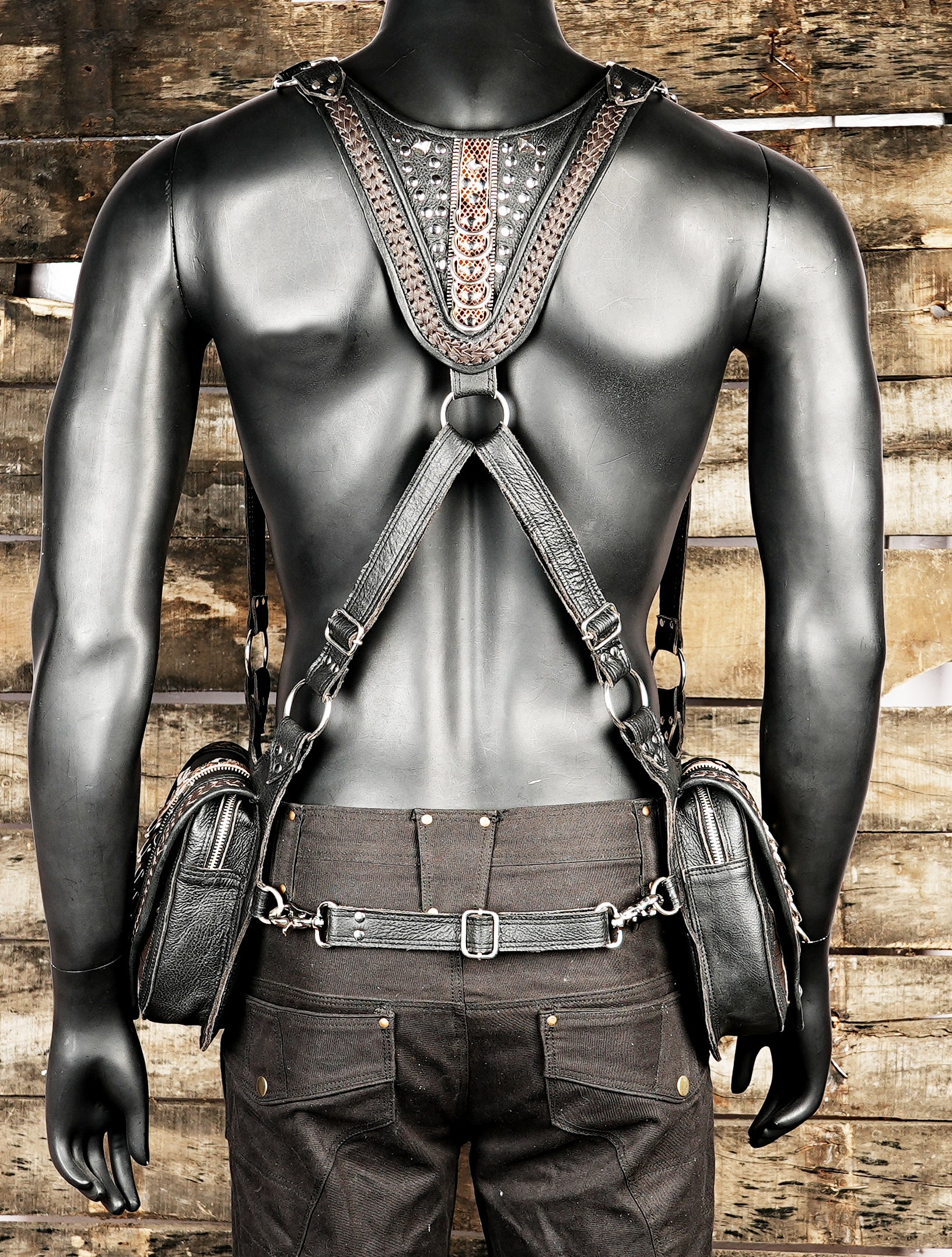 Adjustable shoulder holster with embossed leather patterns