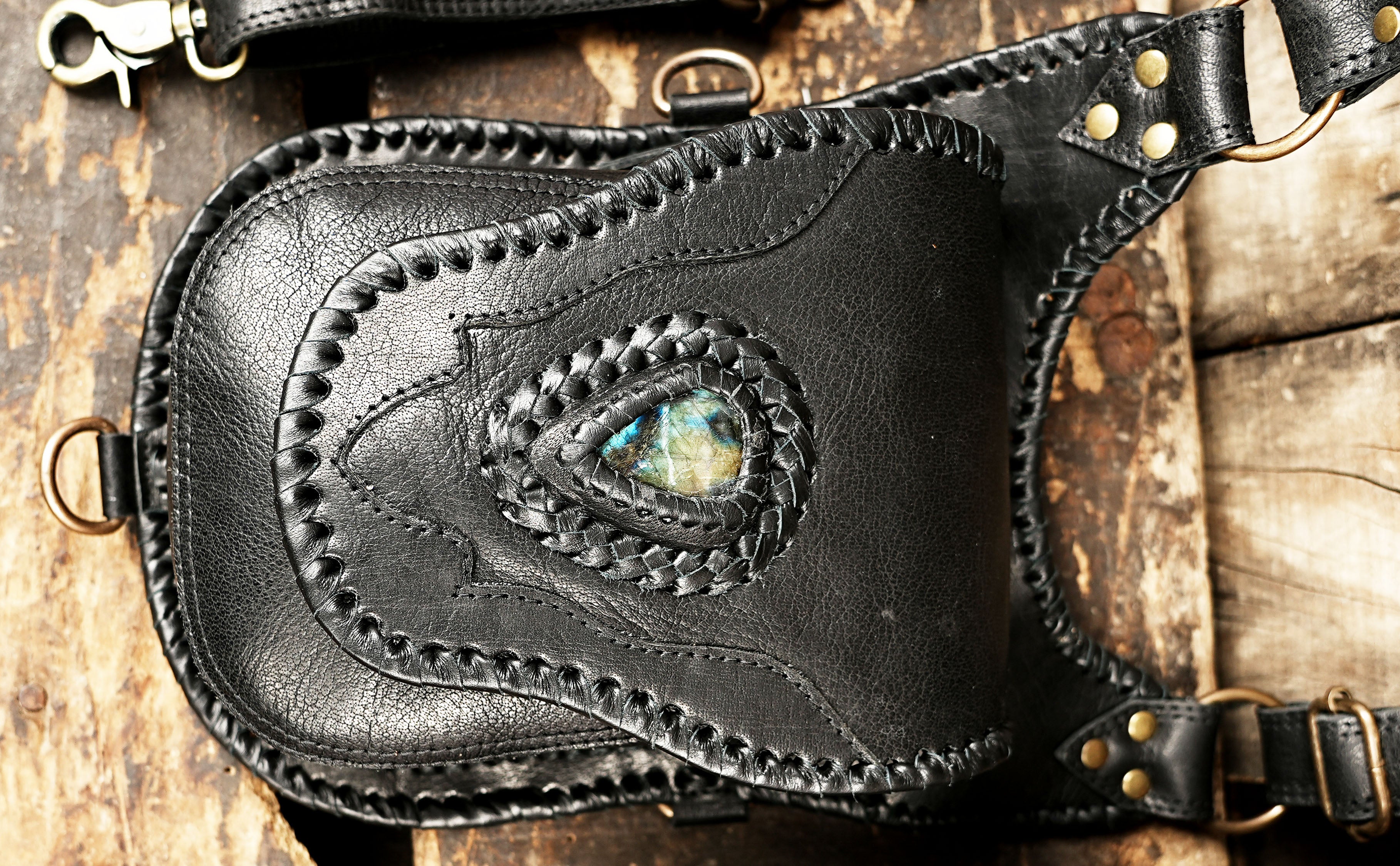 Adjustable leather shoulder holster with stone inlay