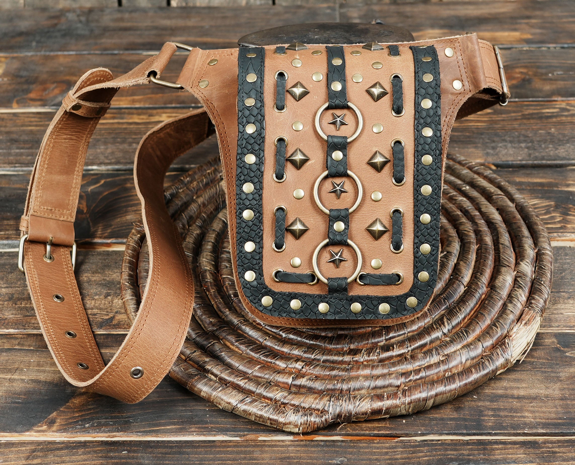 Functional leather pouch belt with secure buckle closure.
