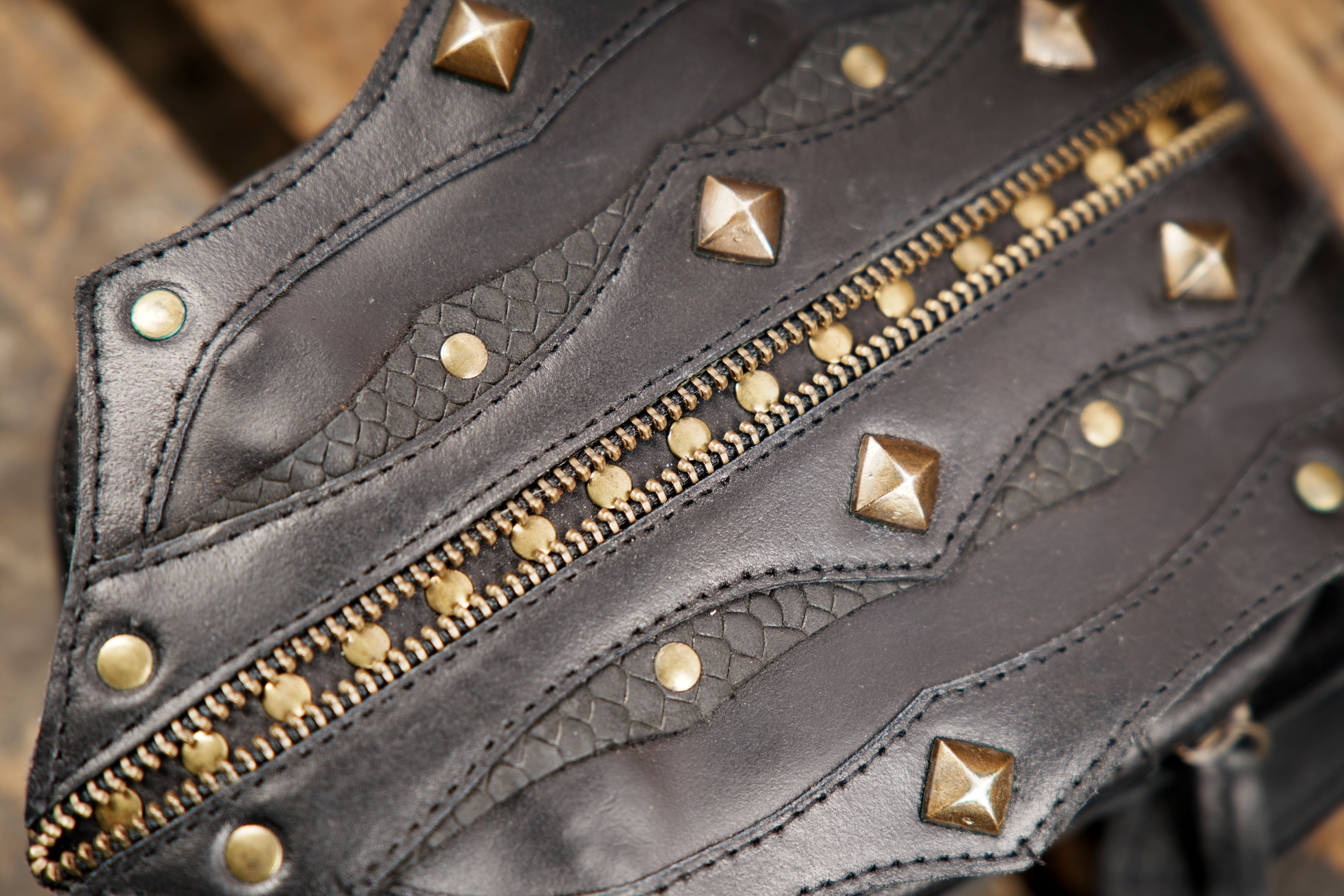 Black leather utility holster with edgy studded pattern