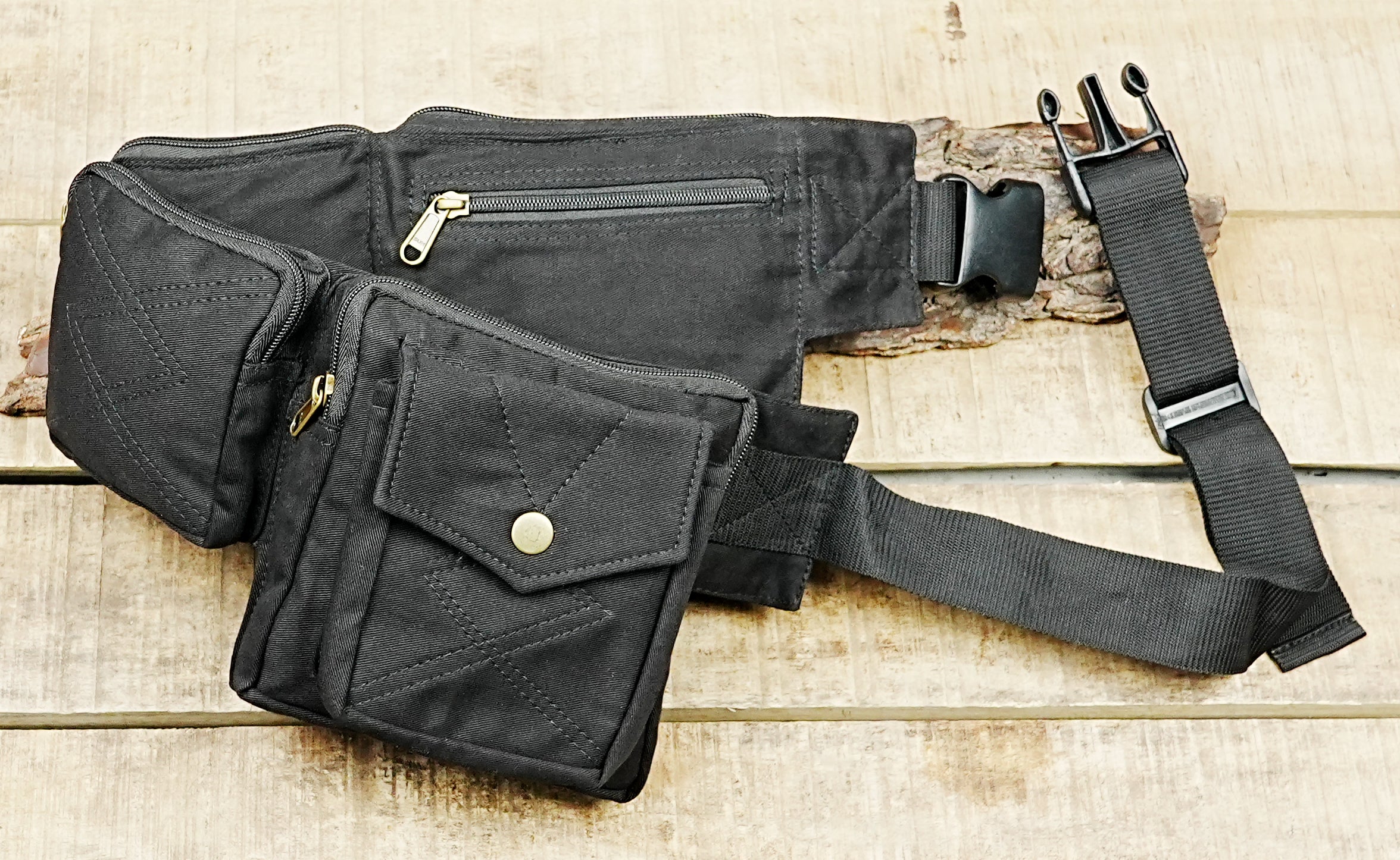 Four-pocket canvas hip belt with brass snaps and zip closures for rave gear