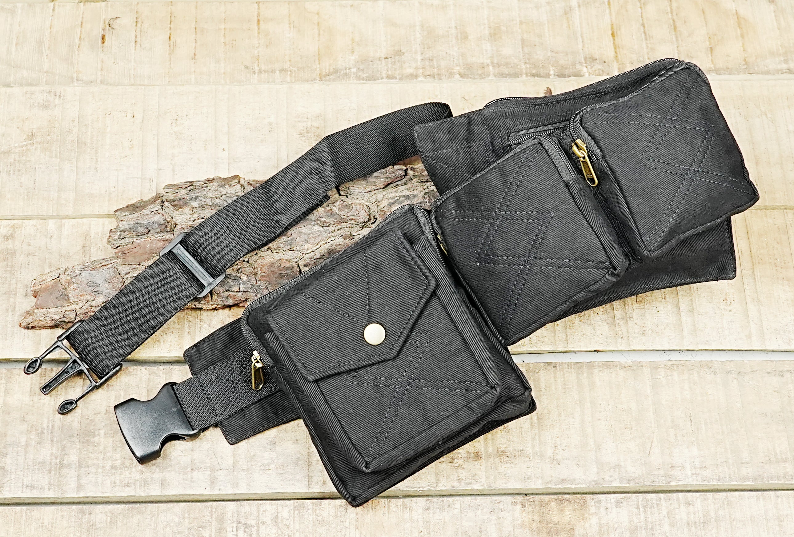 Four-pocket canvas hip belt with brass snaps and zip closures for rave gear