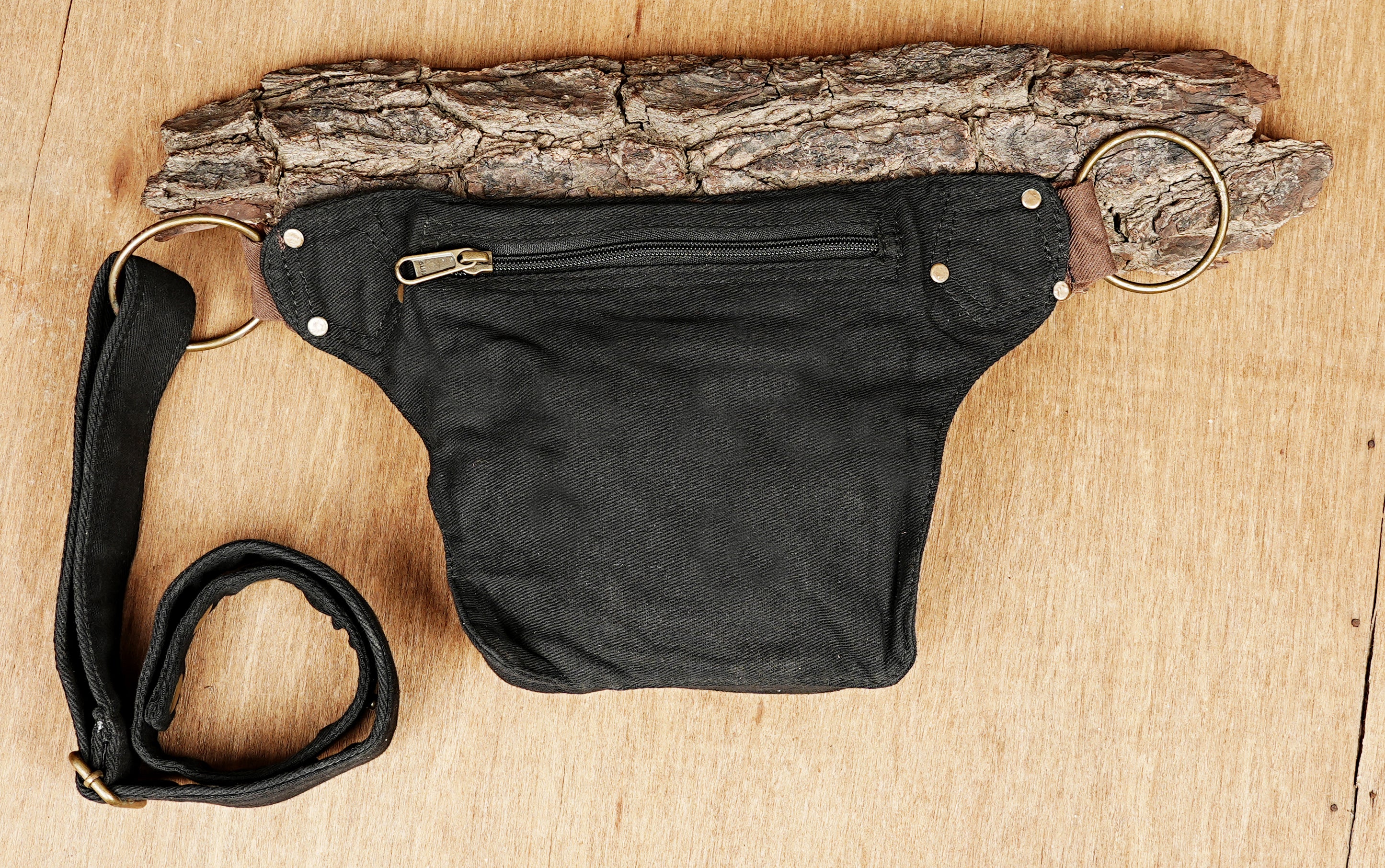 Lightweight and durable fanny pack for festival-goers with unique design and robust metal rings.