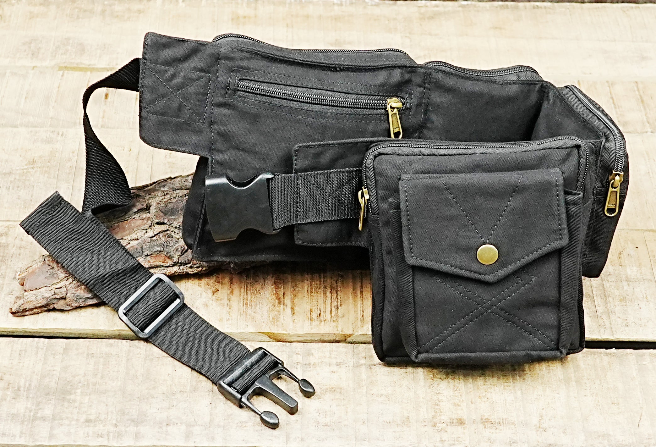Adjustable black cotton waist bag designed for travel, festivals, and market days
