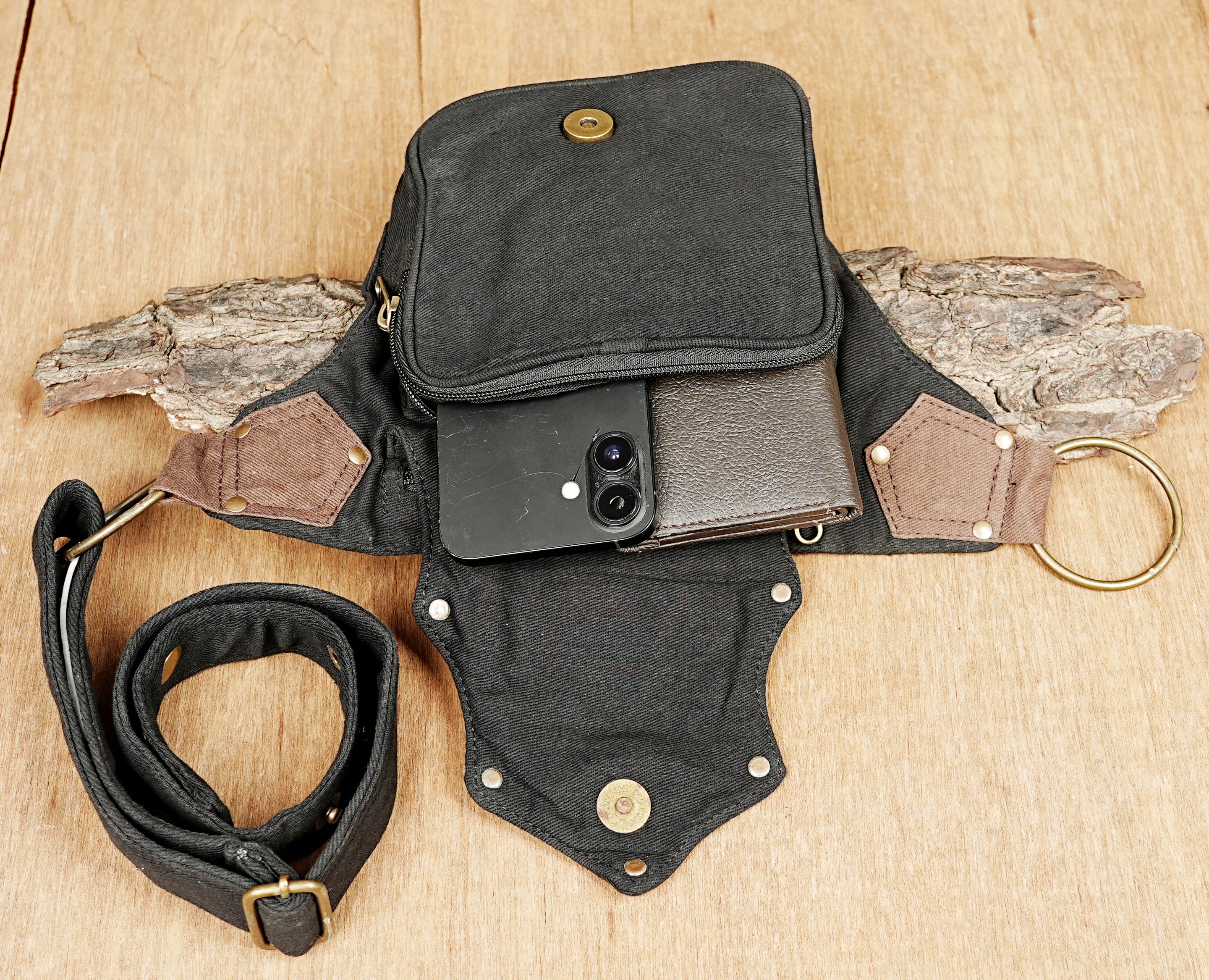 Canvas money belt and passport holder with an alternative, utility-inspired aesthetic.