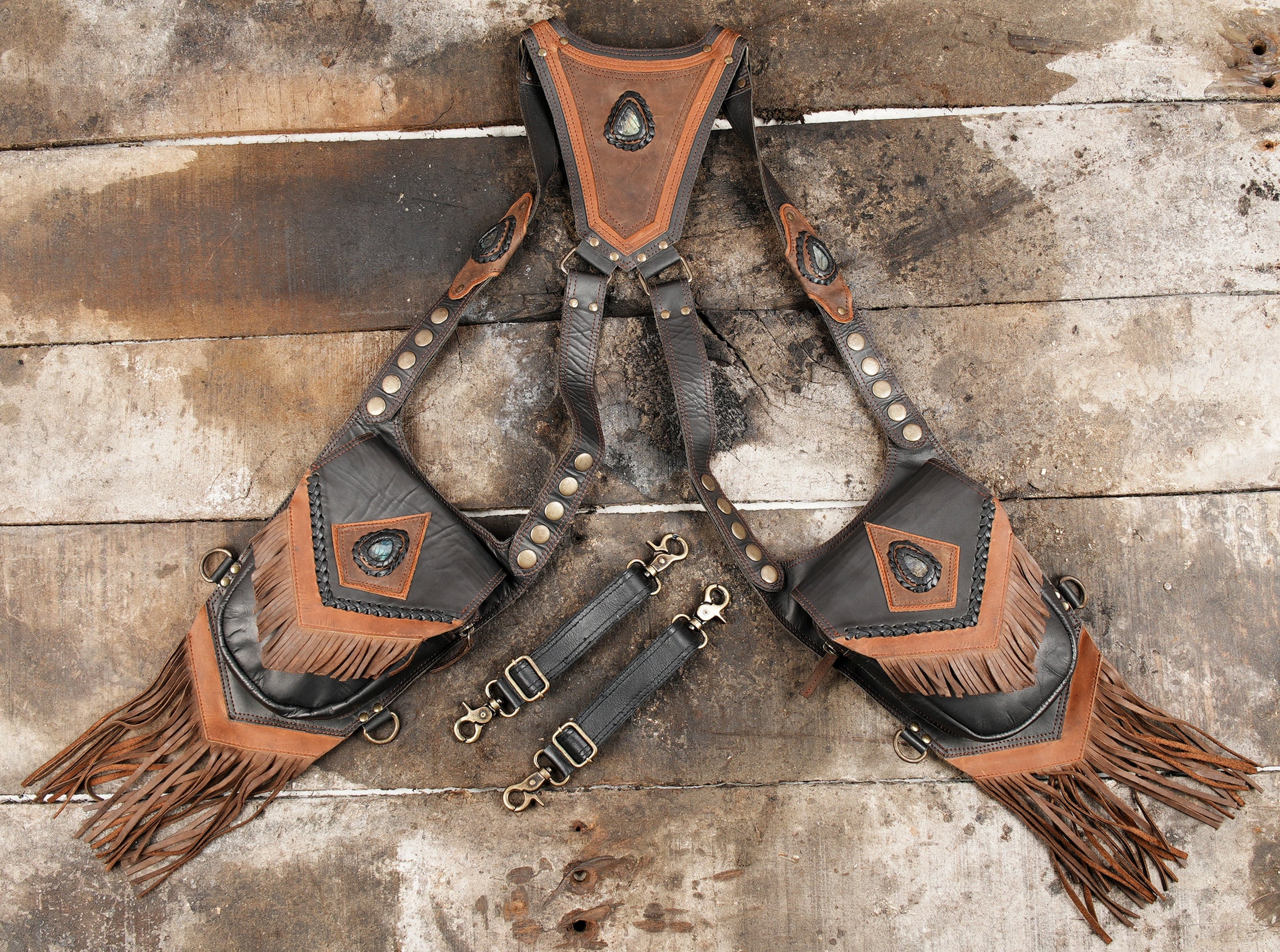 Handmade leather holster with fringe and gemstone detail