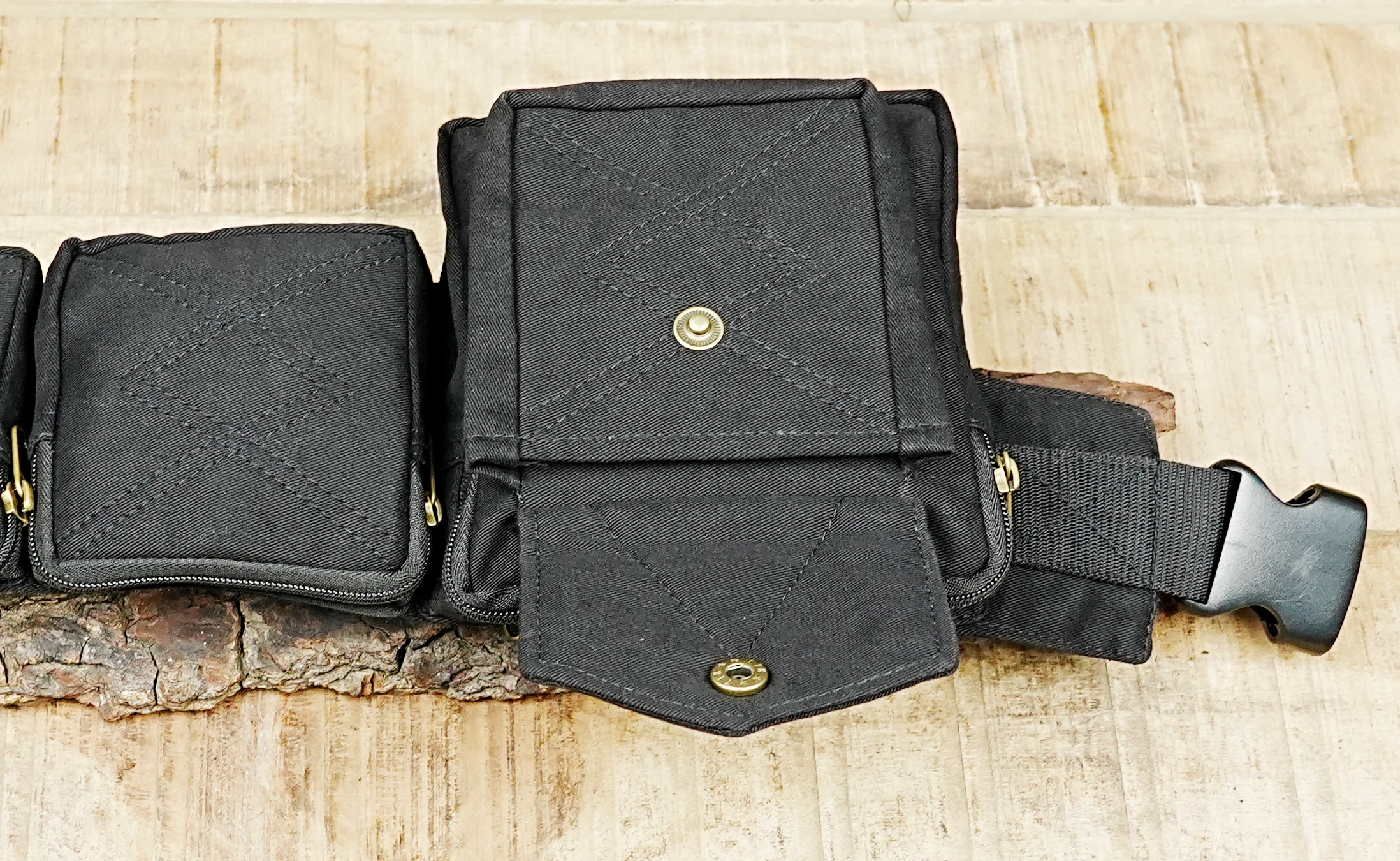 Hands-free travel money belt in heavy-duty black cotton with secure pockets