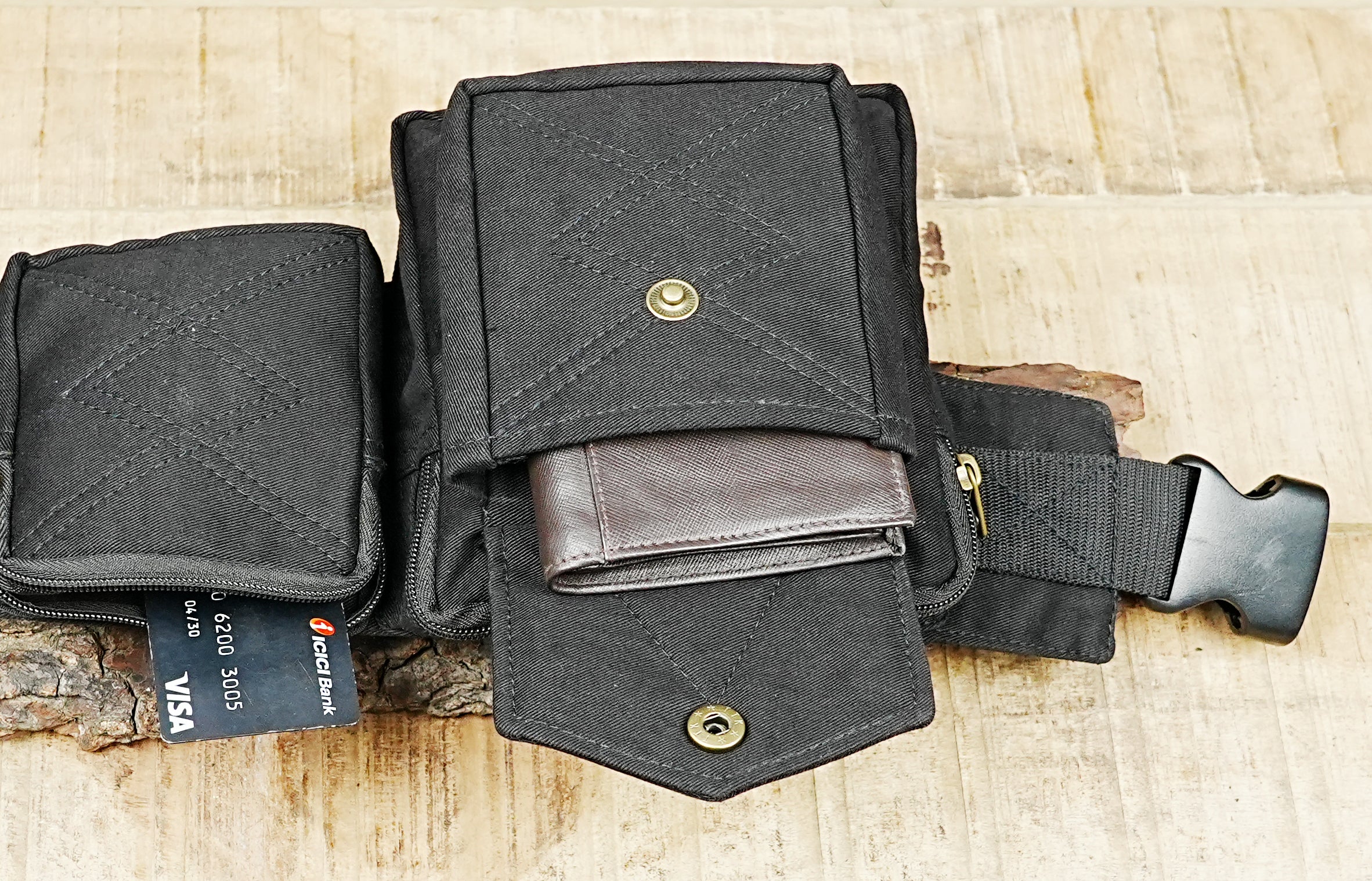 Boho festival pocket belt in washed black canvas with snap-down flap compartments