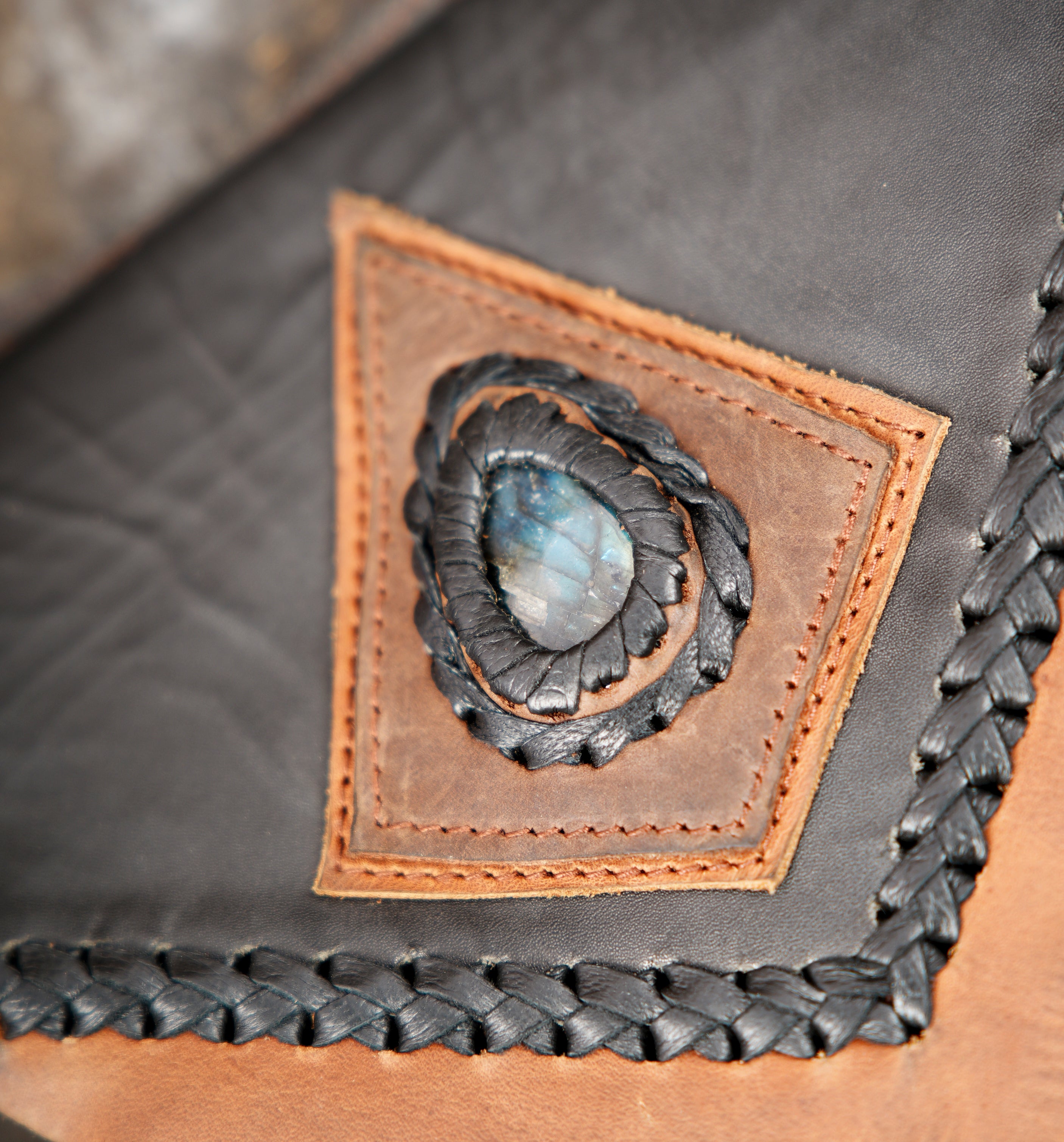 Festival leather holster with natural stone and braided trim