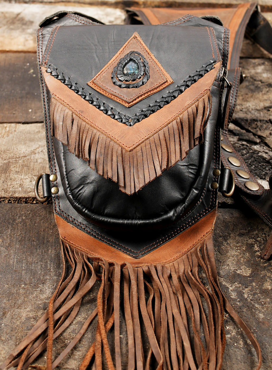 Bohemian leather holster with hanging tassels and stone detail