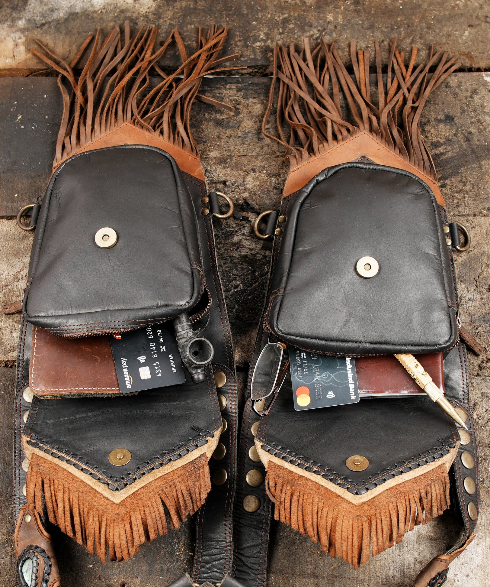 Artisan leather dual holster with fringe and stud accents