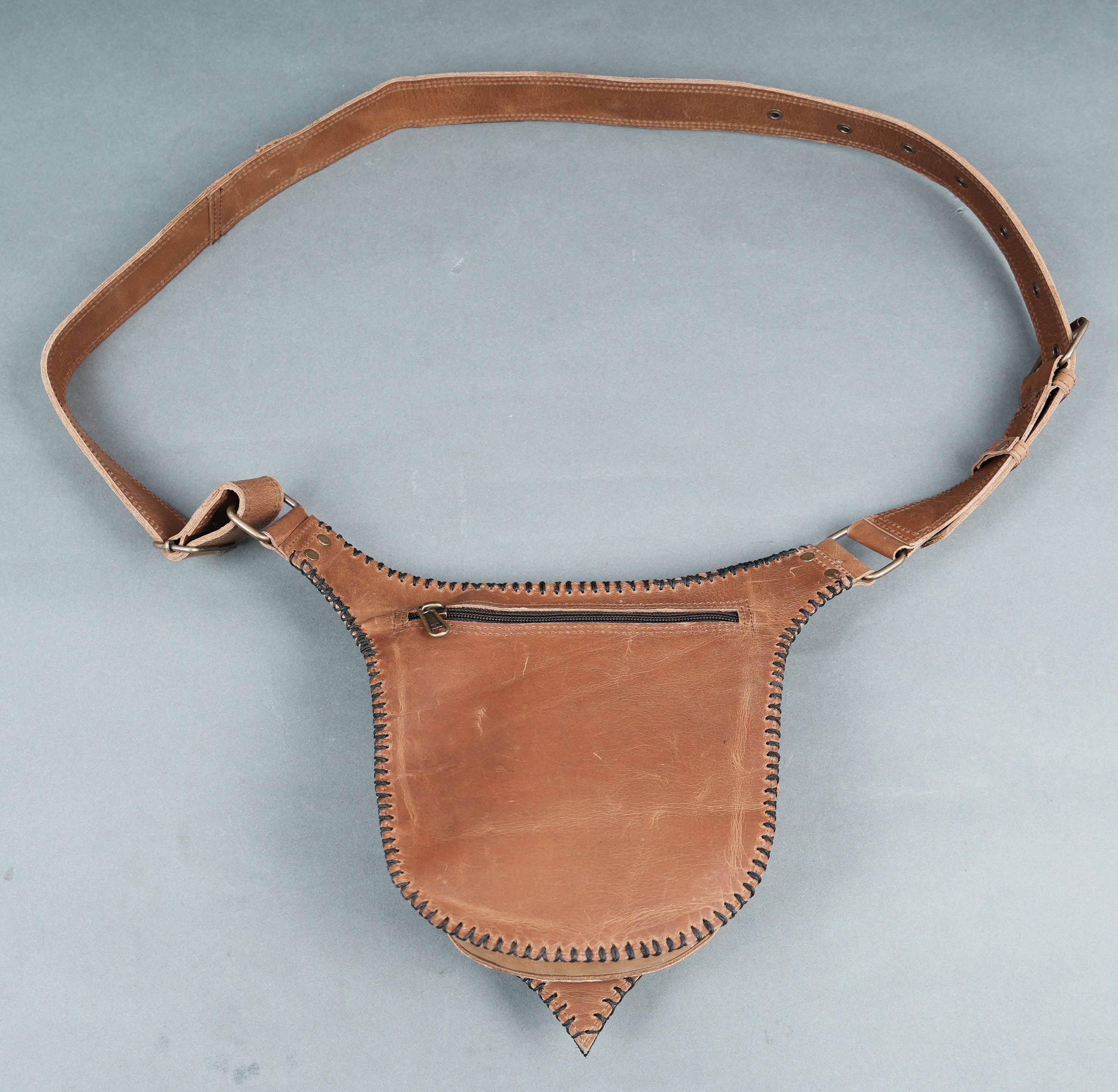 Brown and black leather belt with blue crystal accent