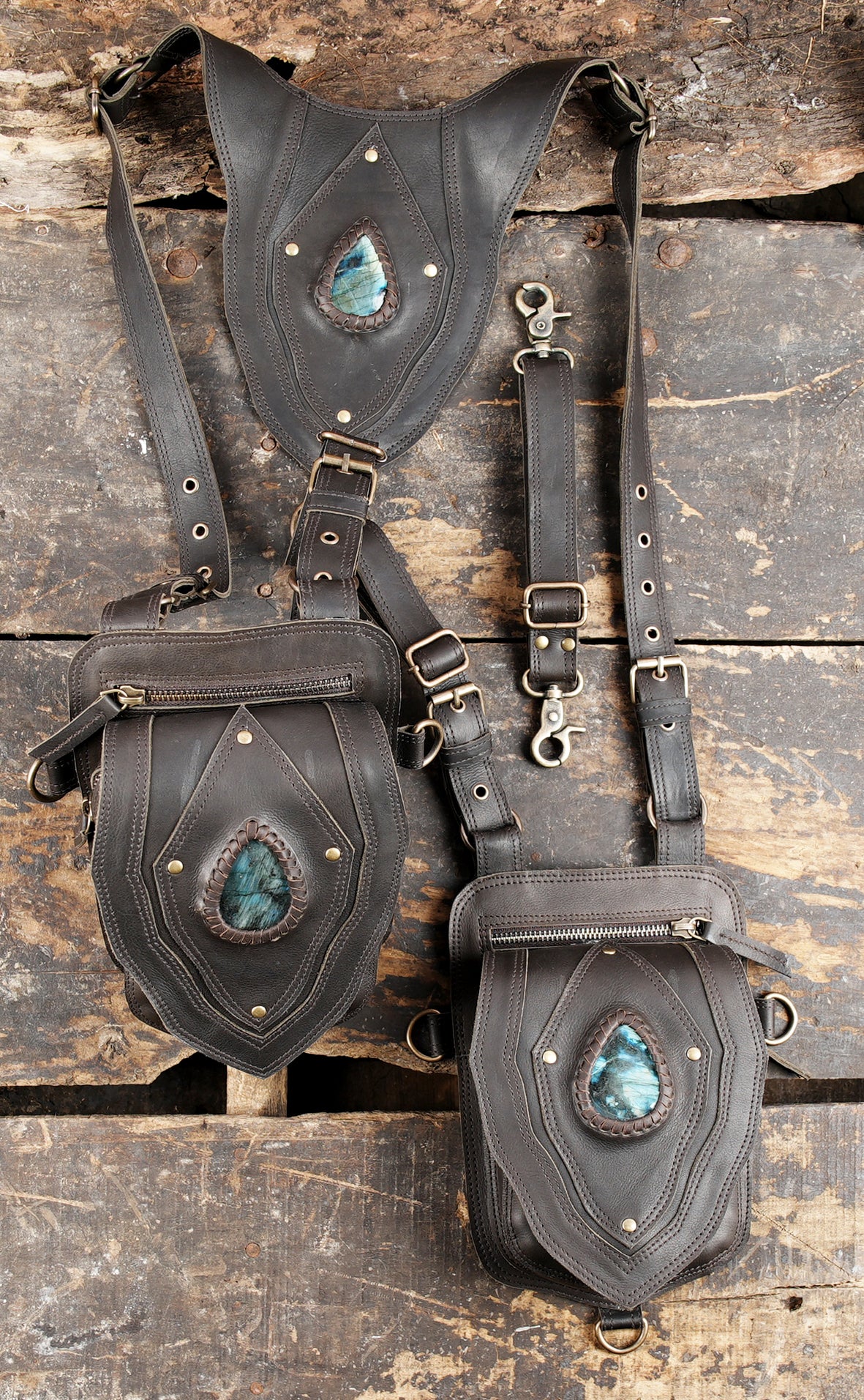 "Dual side leather holster with secure zipper pockets"