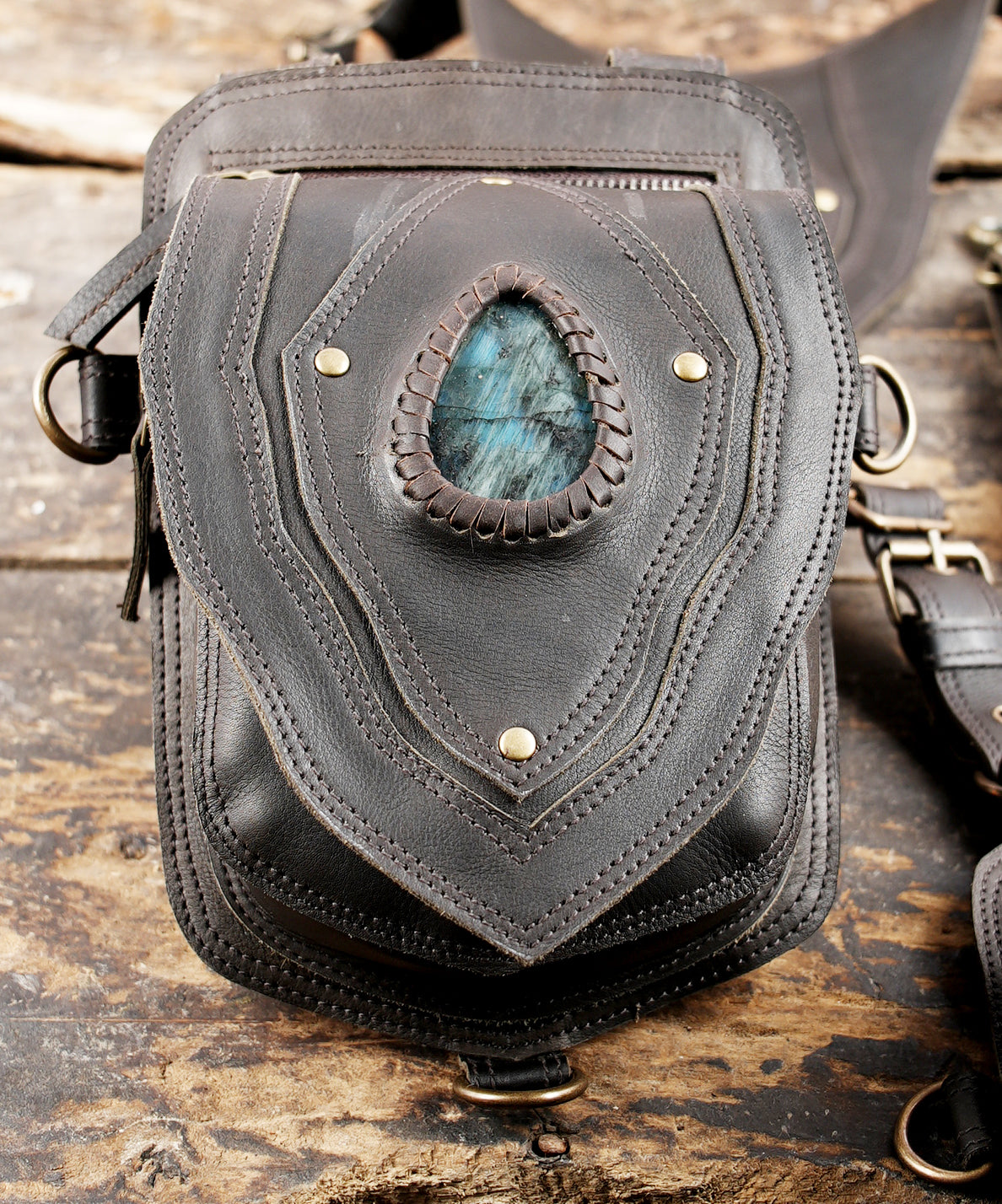 "Unisex leather festival holster with adjustable straps"