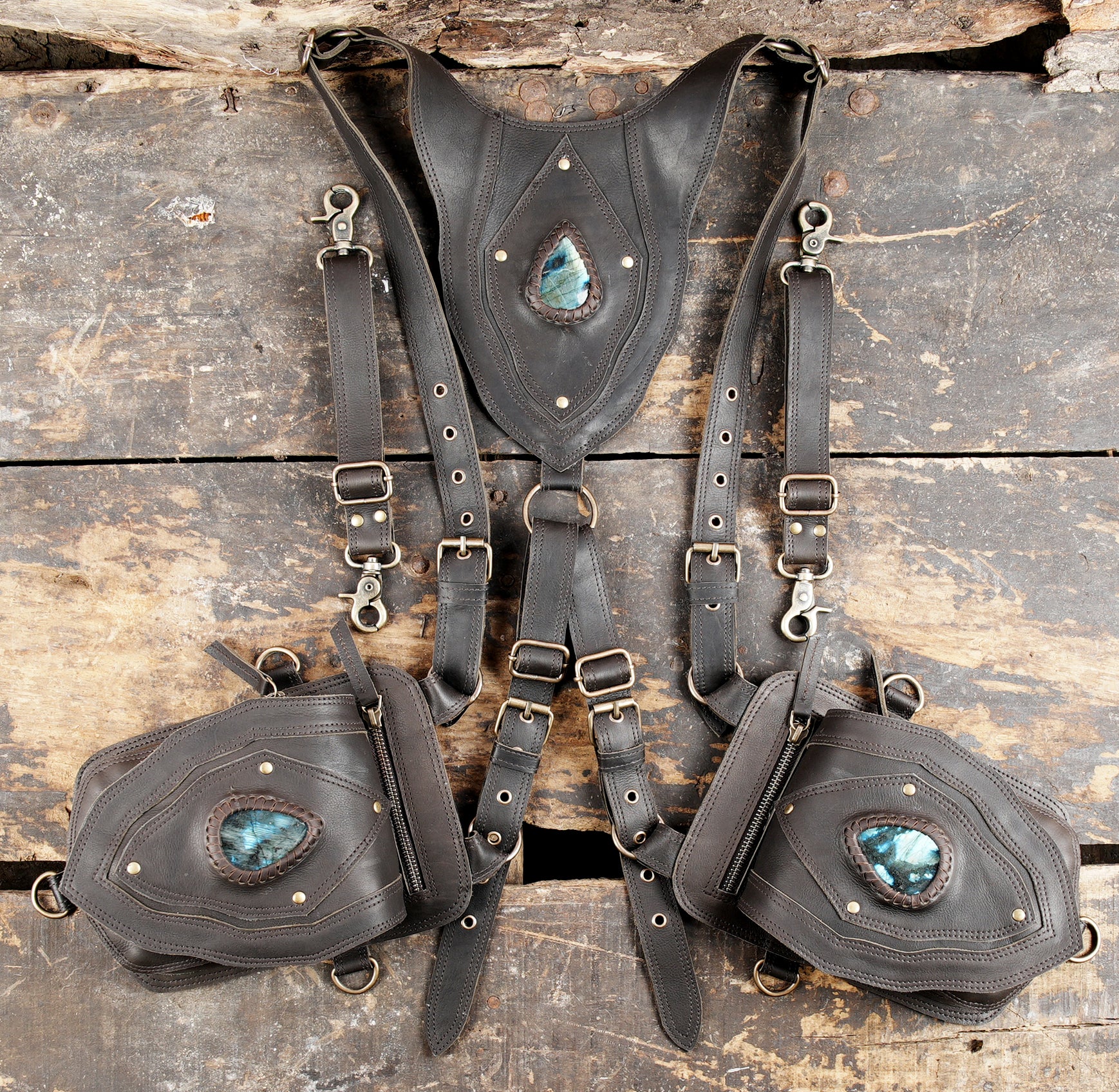 "Steampunk style leather holster with layered geometric design"