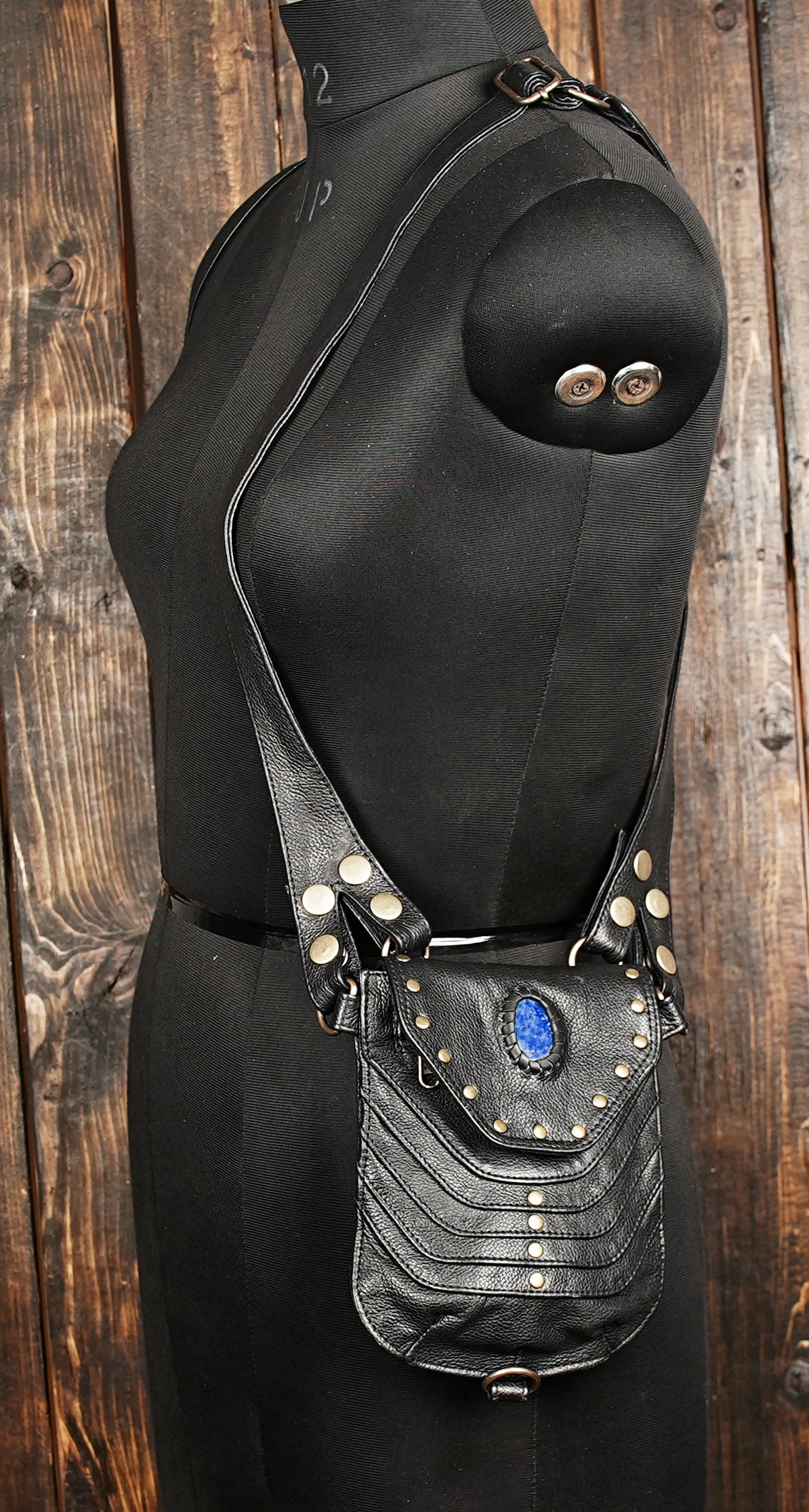 Leather holster belt with adjustable shoulder style straps