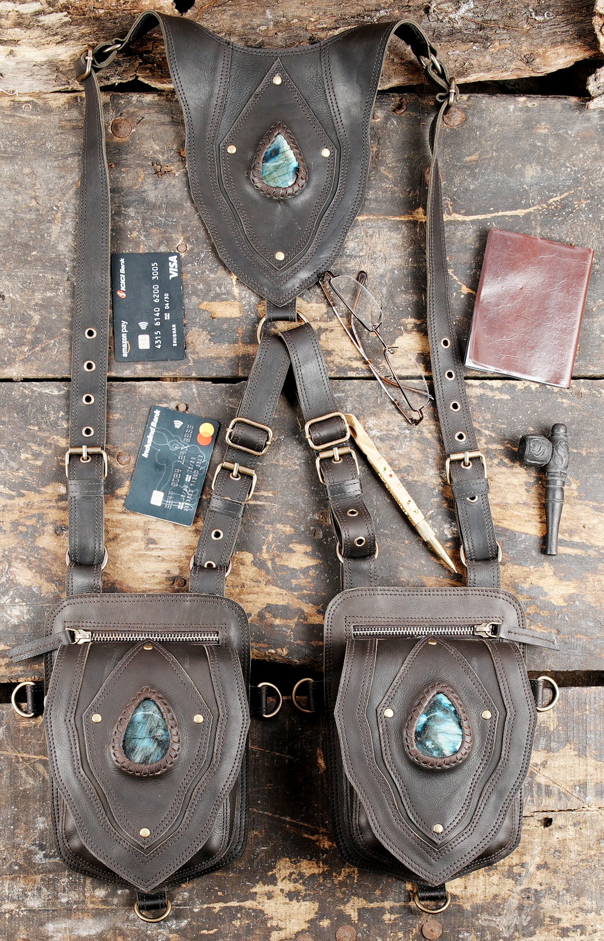 "Leather holster bag with unique gemstone front panel"