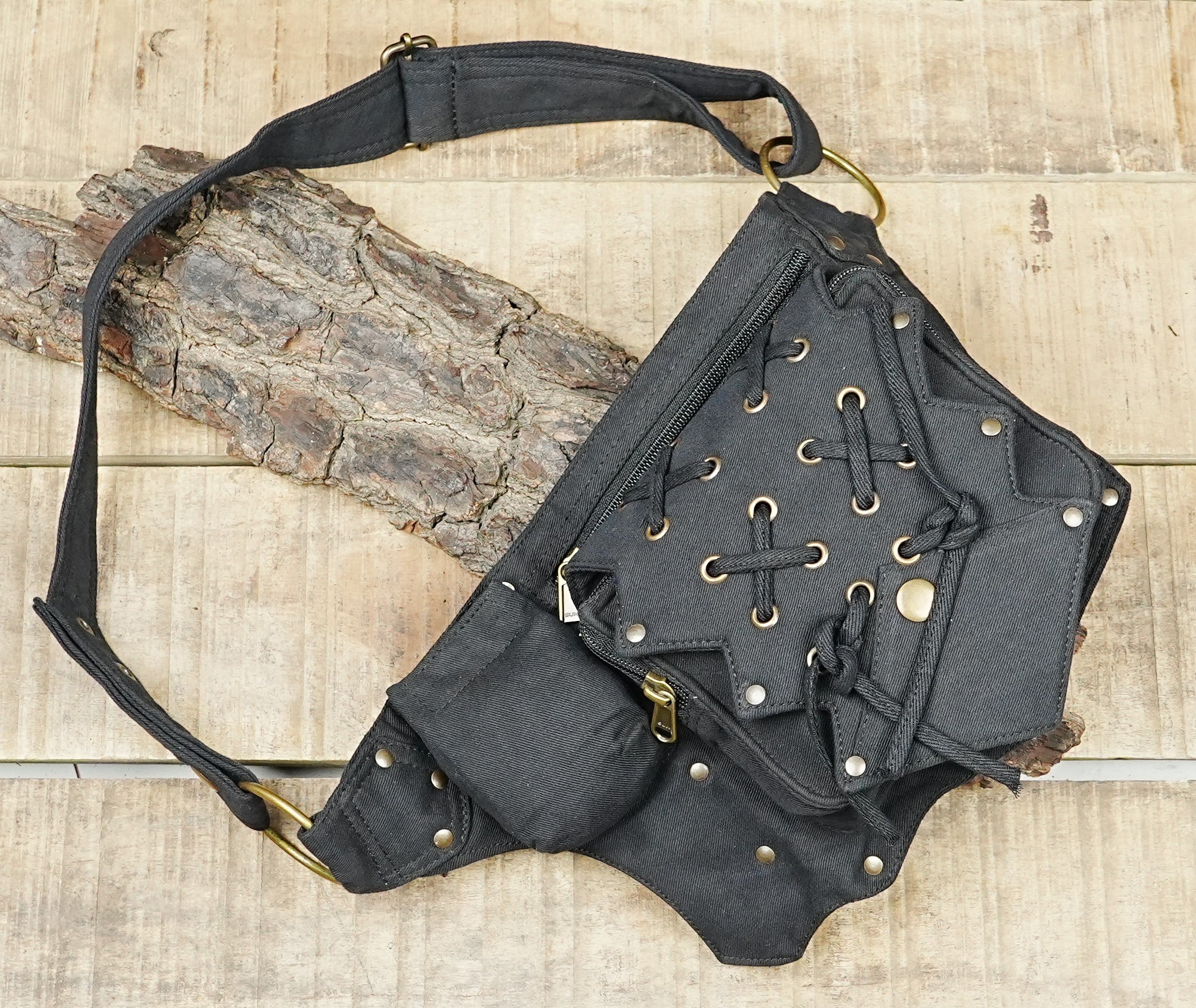 Alternative fashion black utility belt with detailed criss-cross lacing