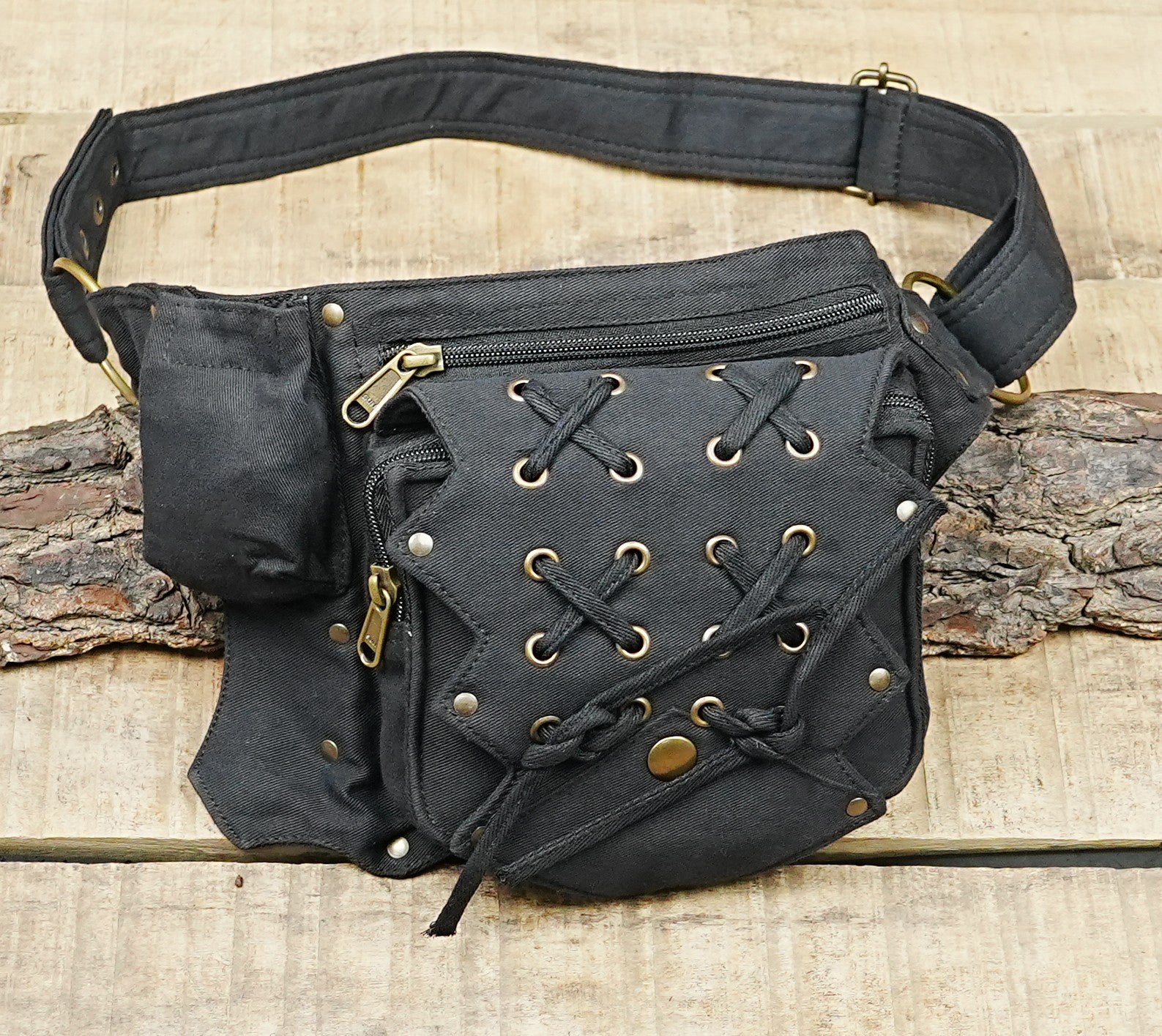 Bohemian black festival hip bag with secure zip pockets and metal studs