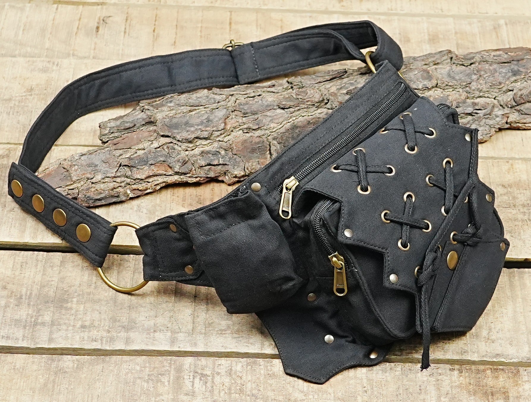 Handmade black waist pack for travel, hiking, and everyday wear
