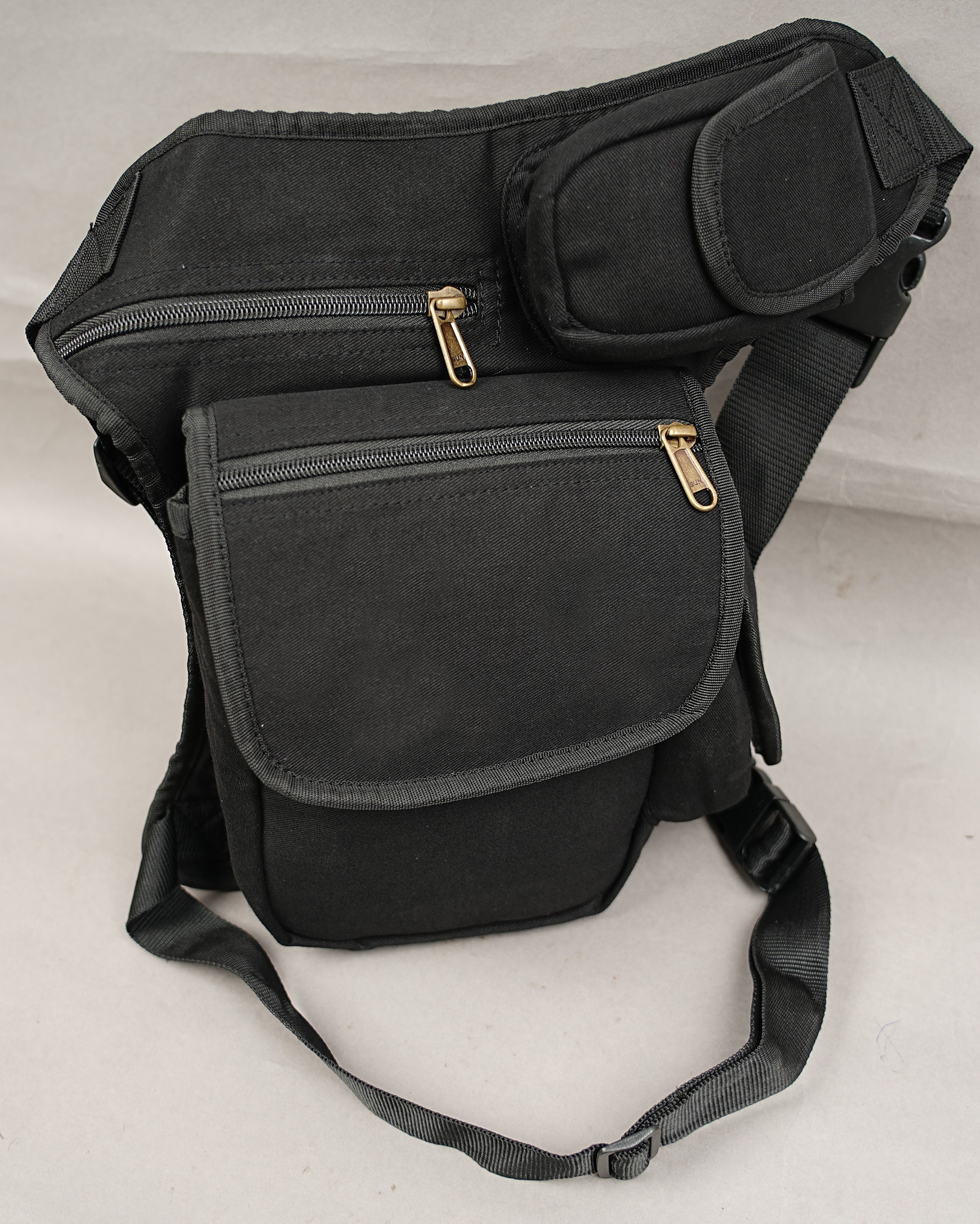 Unisex cotton canvas hip and thigh bag with secure zippered travel pockets.