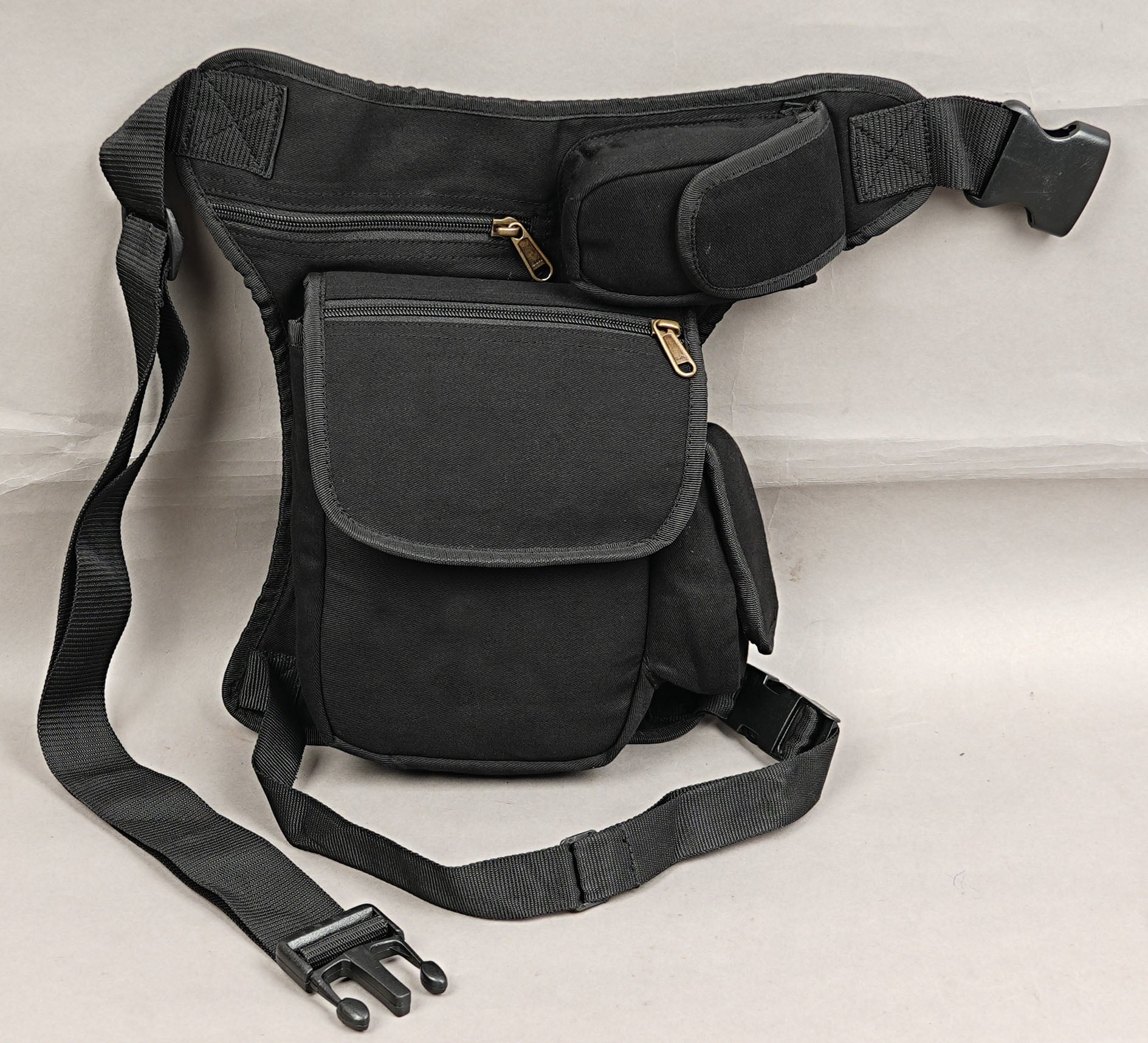 Gothic cyberpunk canvas waist pack with multi compartment storage.