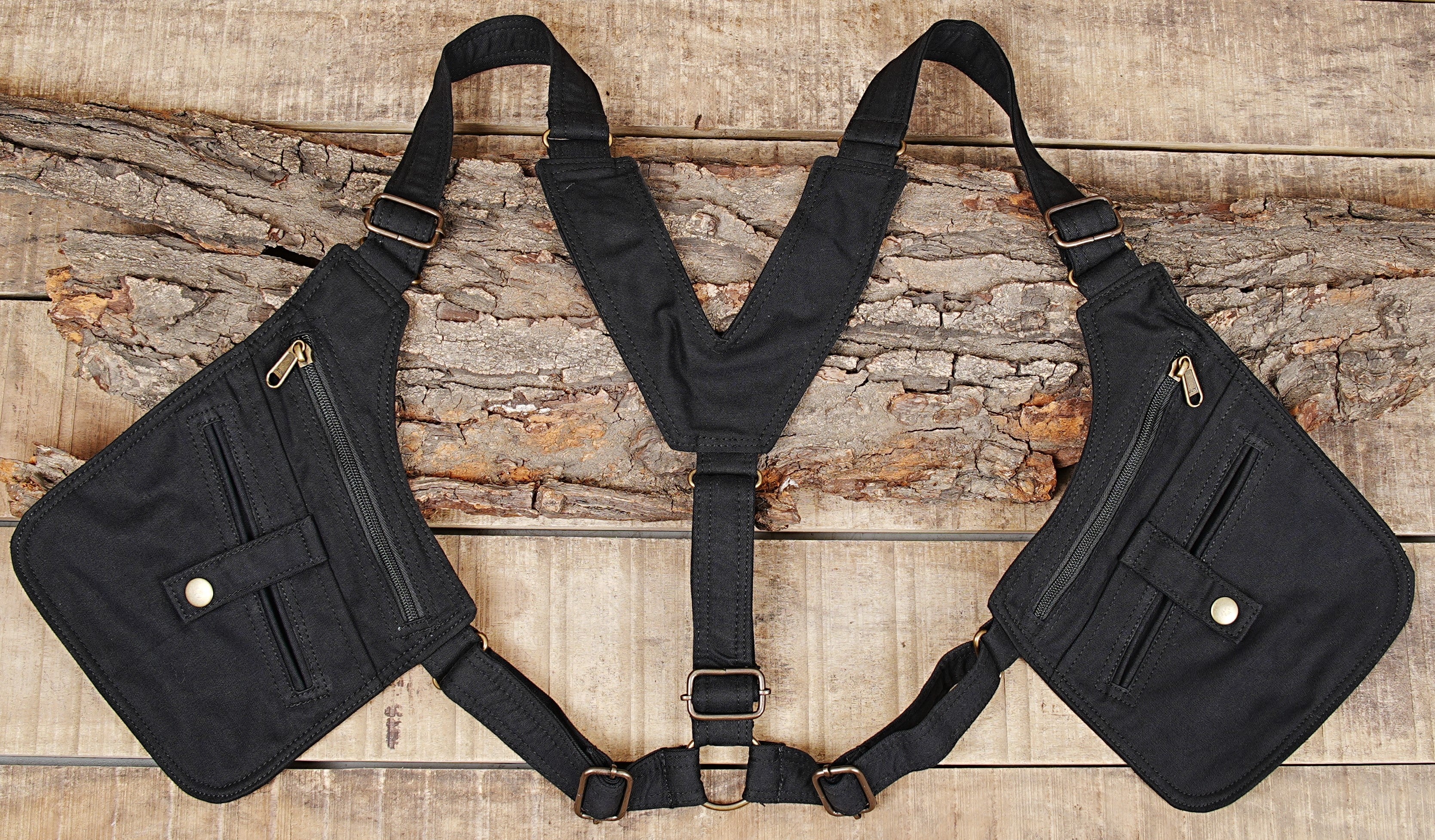 Rugged canvas chest harness showcasing double pockets and button details