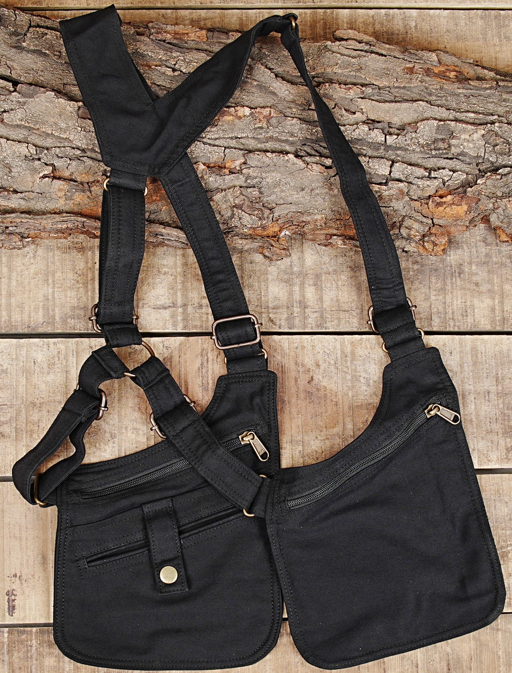 Adjustable double shoulder bag with secure zippered compartments and button flaps