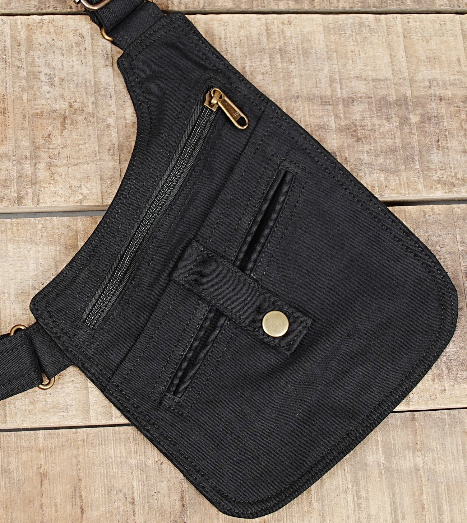 Handmade gothic utility chest rig and dual pouch vest designed for festival goers