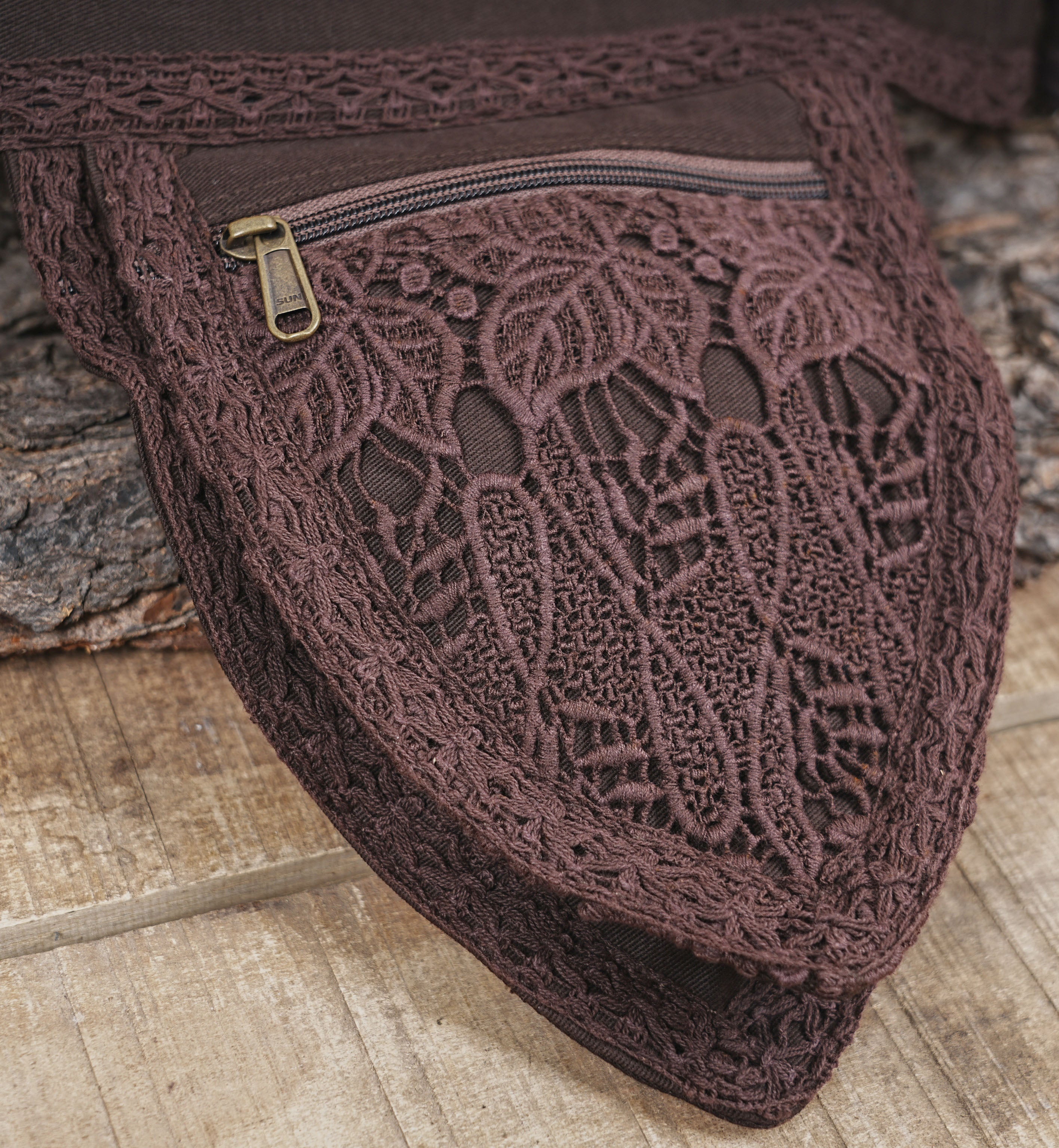 Alternative brown pocket belt and tribal fanny pack for outdoor events