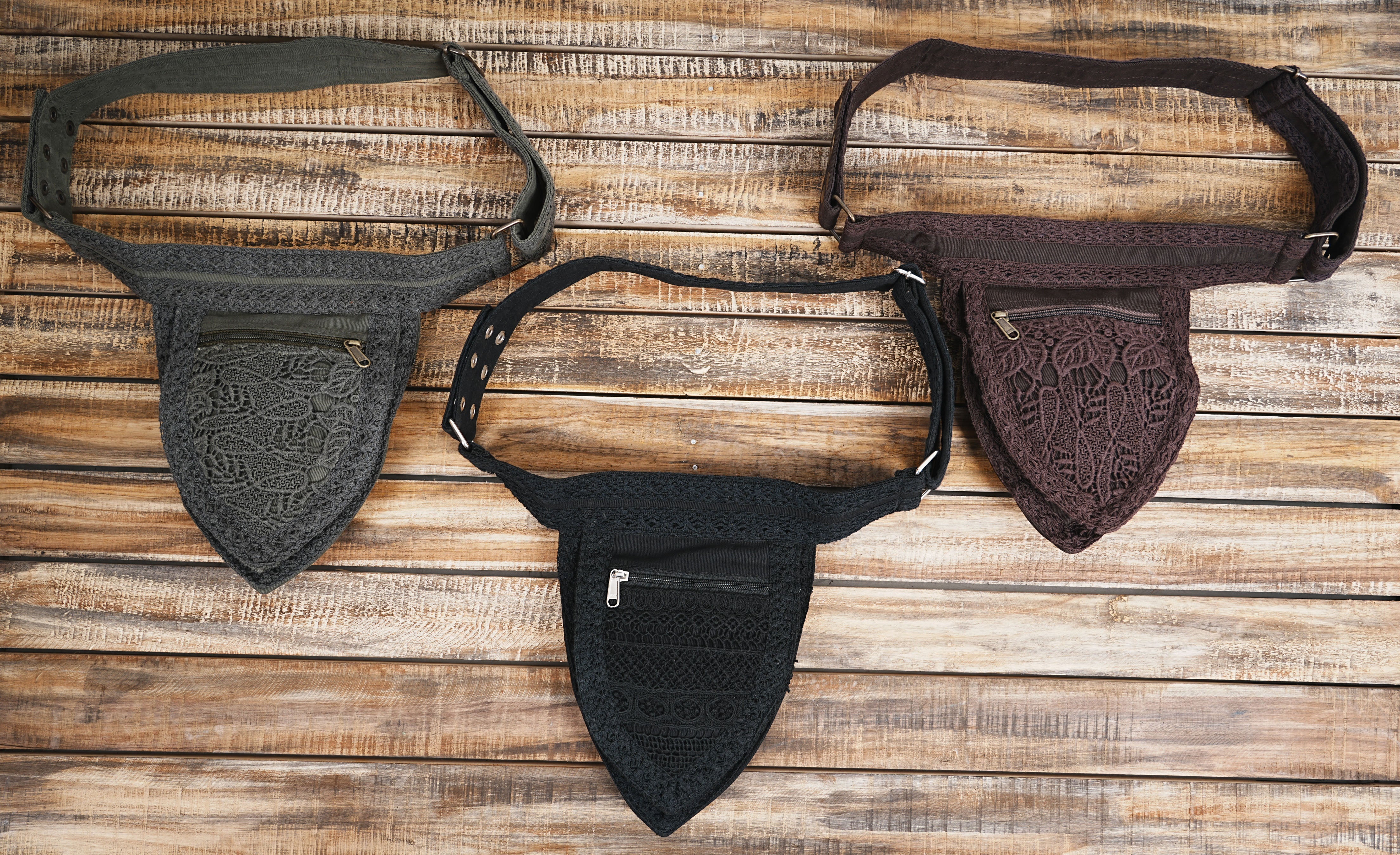 Packing light: This black lace utility belt bag holds all the essentials for a day trip.