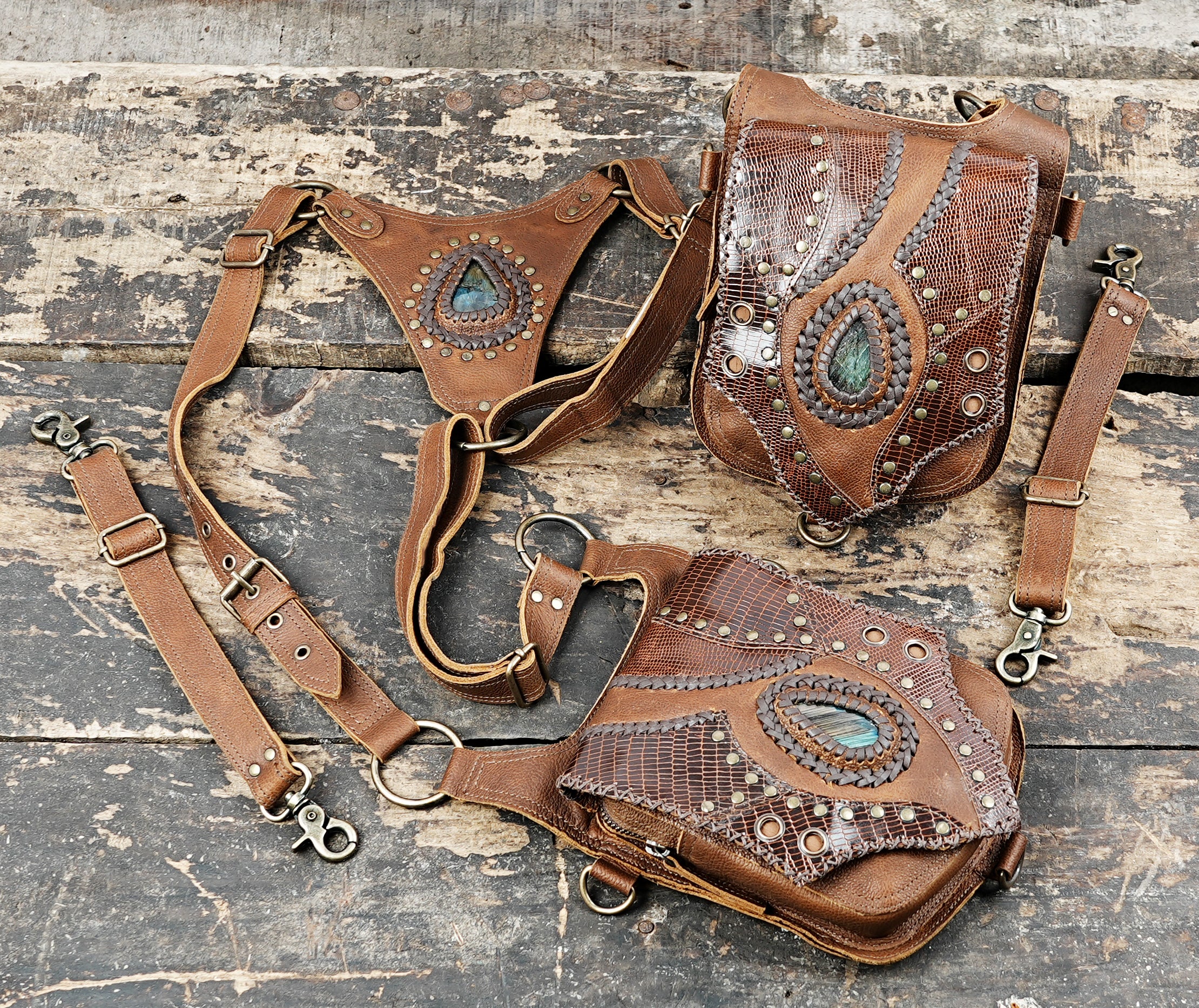 “Brown festival holster with adjustable straps and decorative gemstone accents”