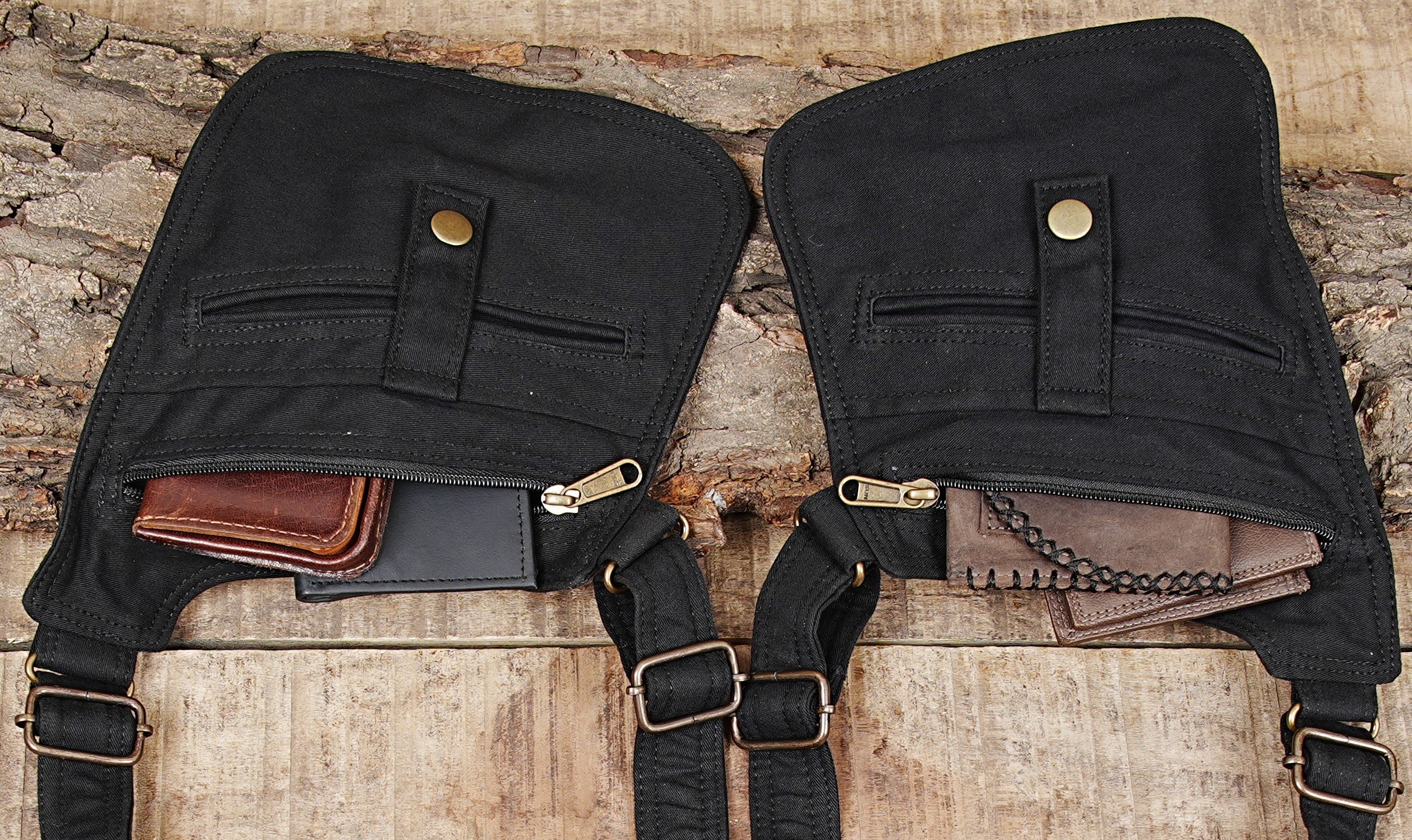 Industrial punk style shoulder bag with multiple zippers and snap buttons